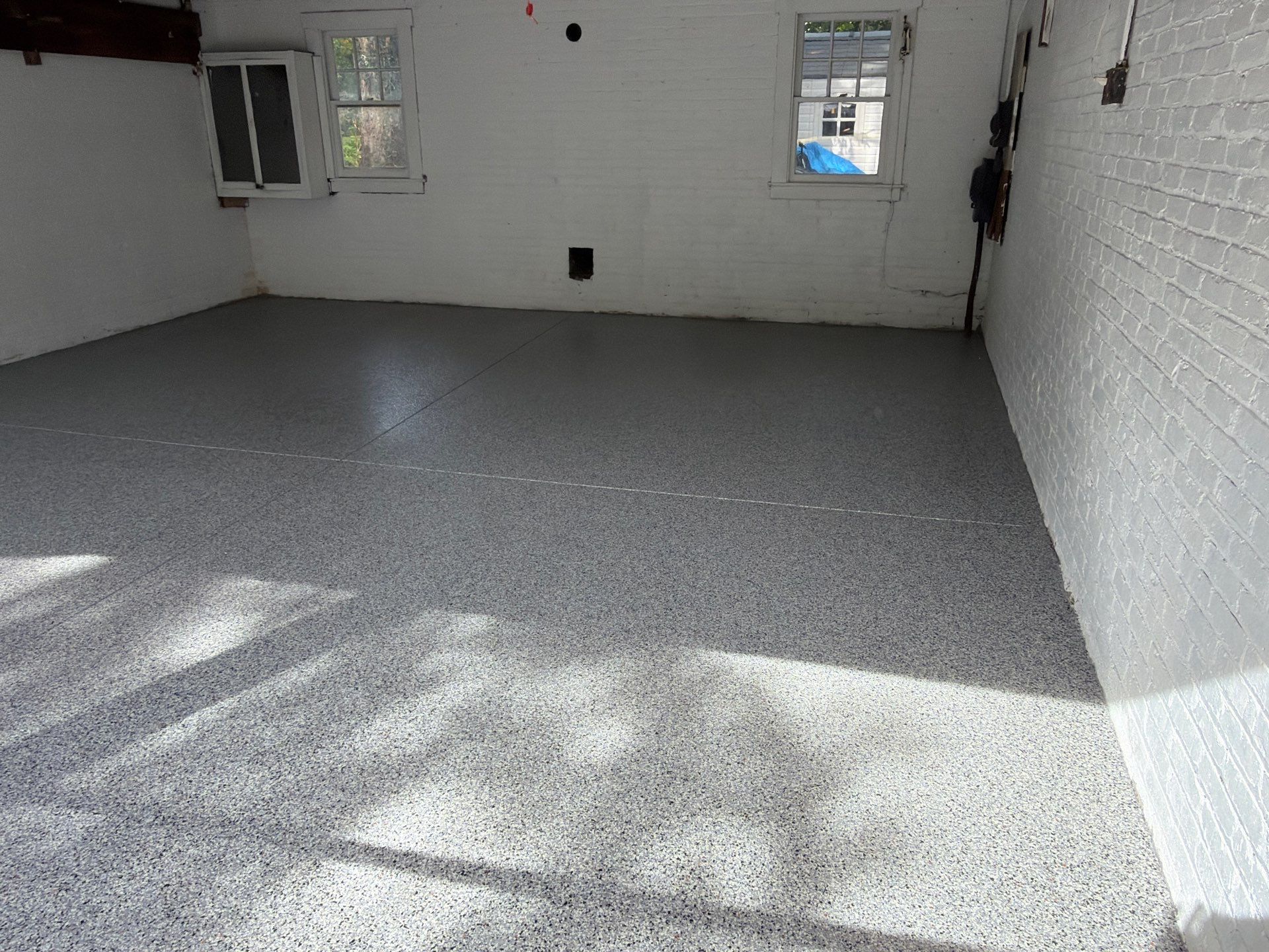 Earth Effects Patron Garage Coating by NG Masonry & Construction LLC