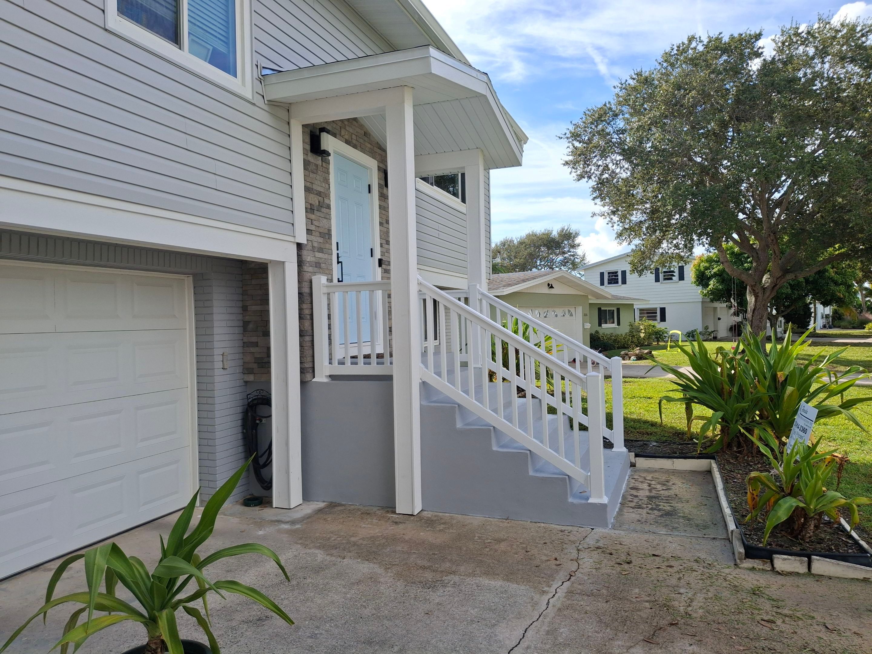 Vinyl Siding Replacement and Exterior Renovation in Satellite Beach by Florida Roofing and Renovations Inc.