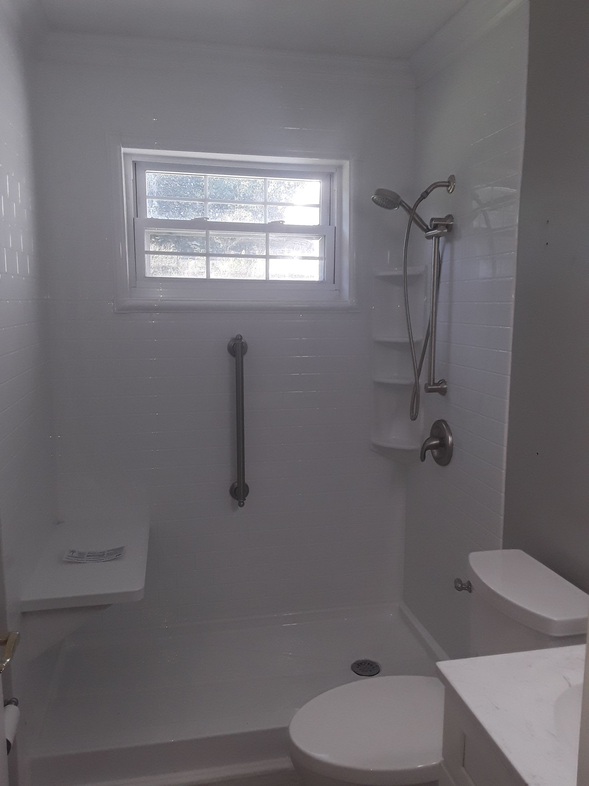 Tub to Shower Conversion using BCI Acrylic Shower System by Secure Construction Company Inc