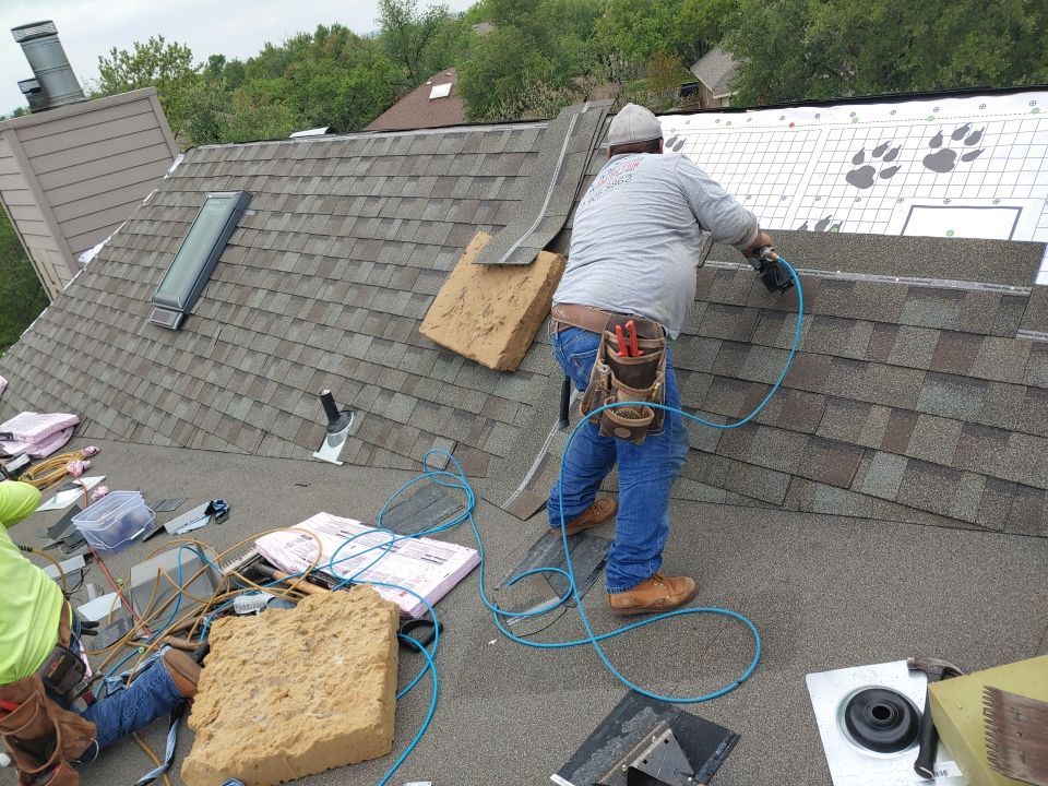 Residential Roof Replacement and Solar Panel Integration in Austin by Caliber Restoration LLC