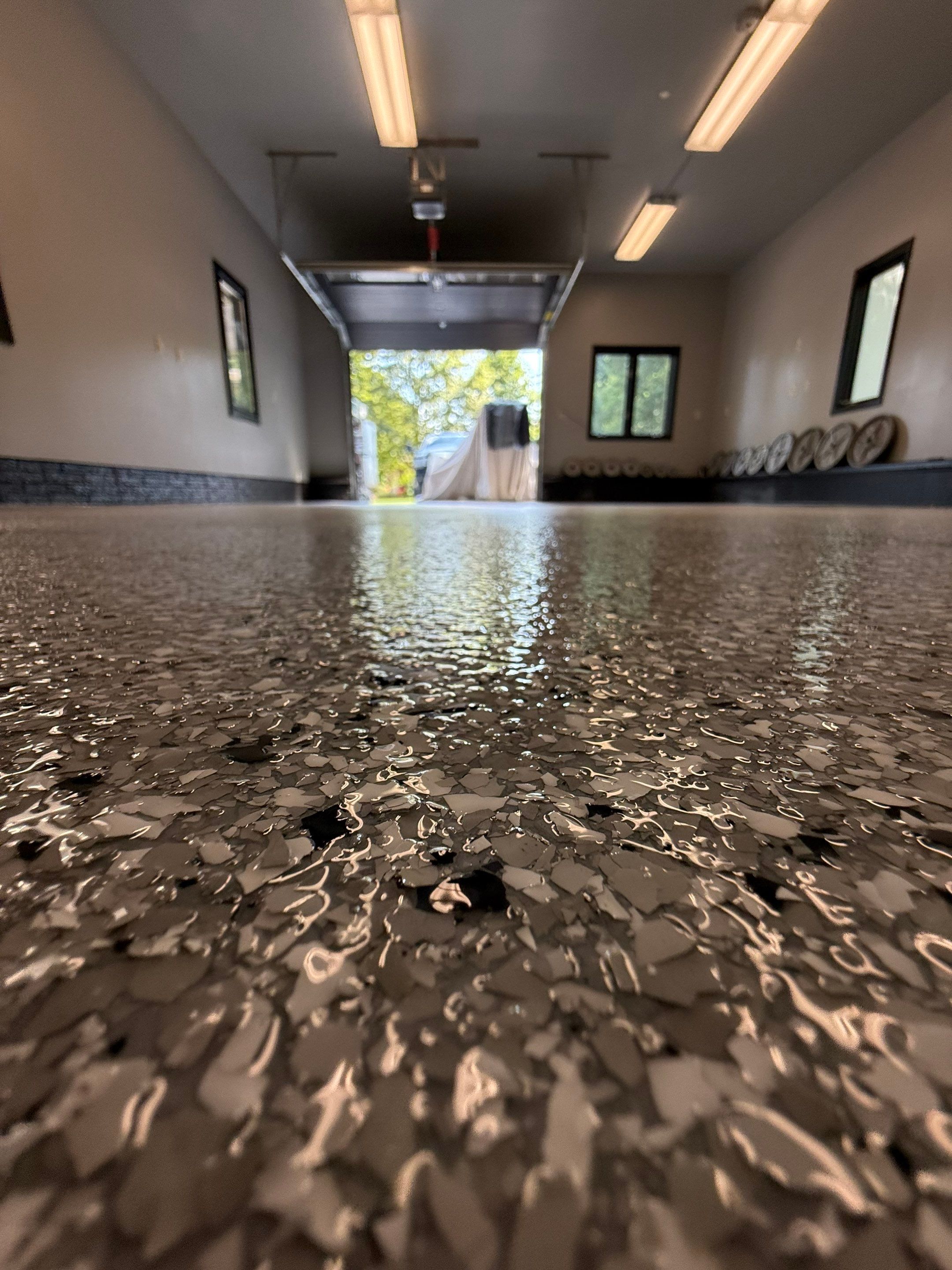 Garage Floor and Textured Pool Deck Coating in Sioux Falls by Select Painting, Coatings & Garage Cabinets