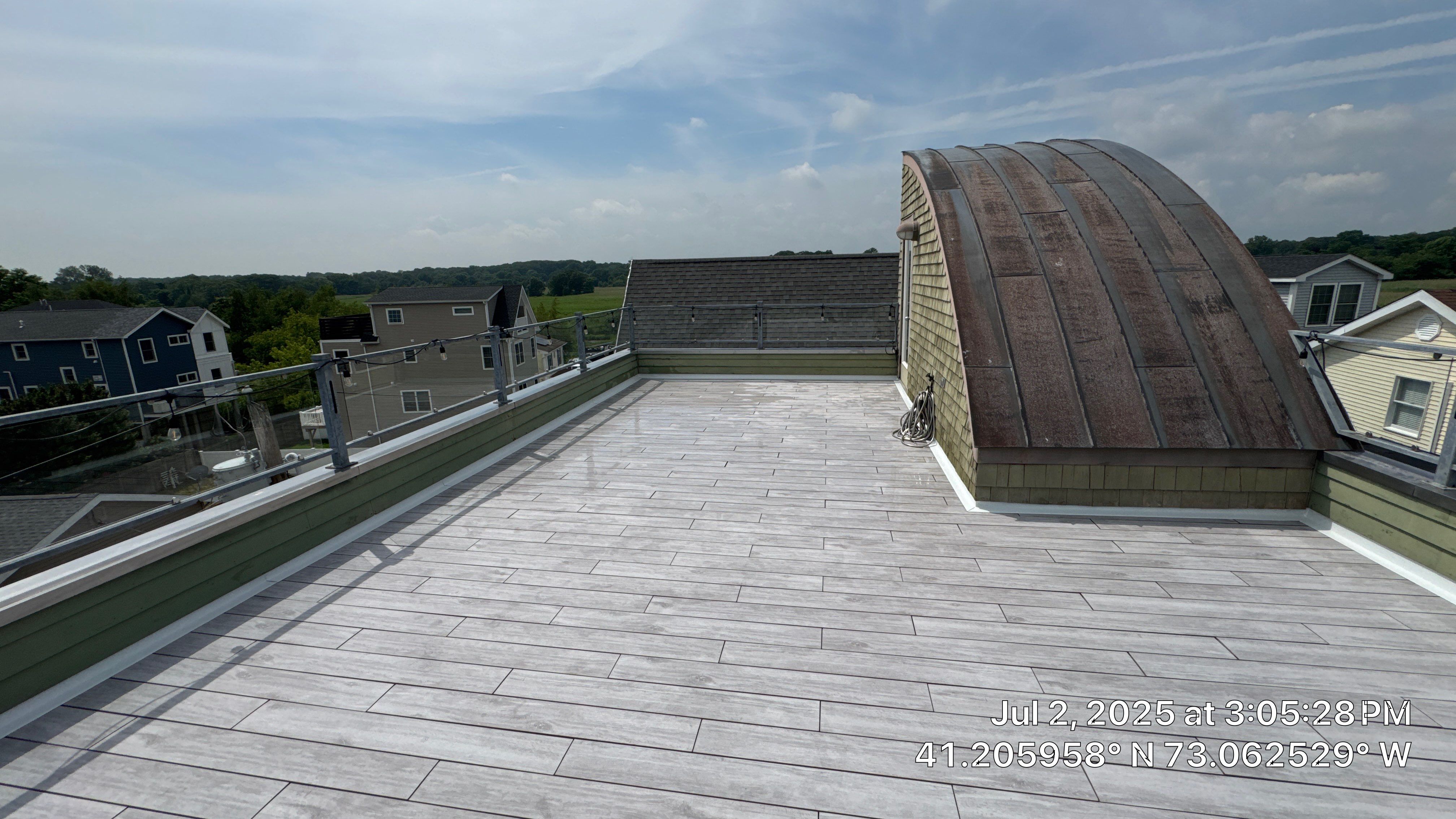 Deck Installation using Tanzite Stone Decking by A Plus Exterior