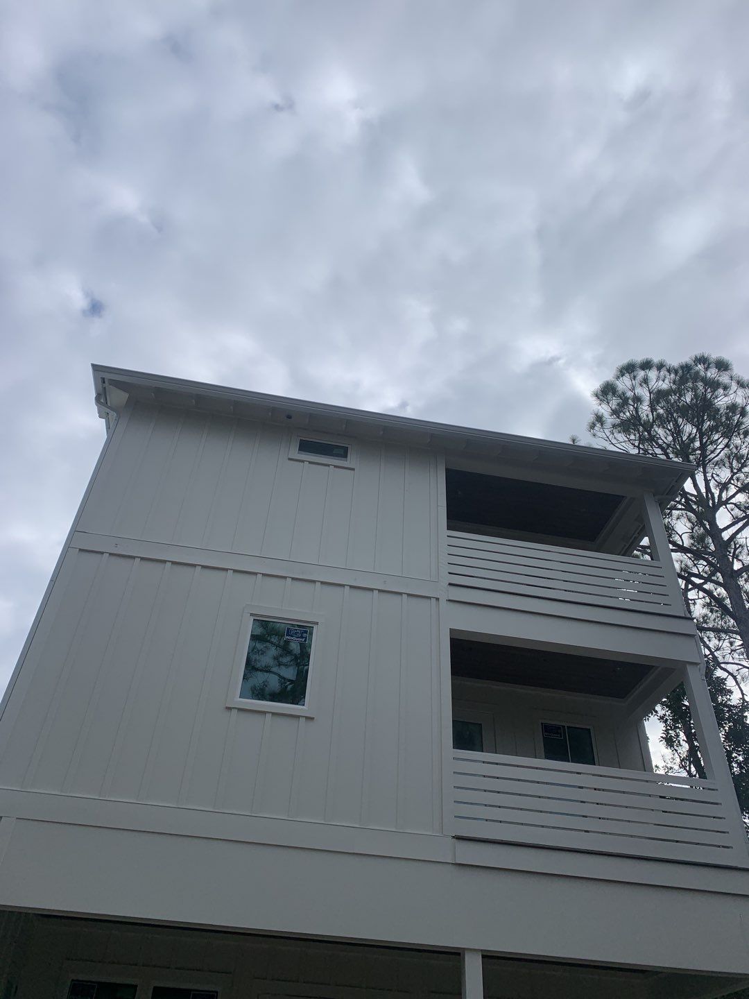 6-inch White Seamless Gutters in Santa Rosa Beach, FL by Gutter Professors