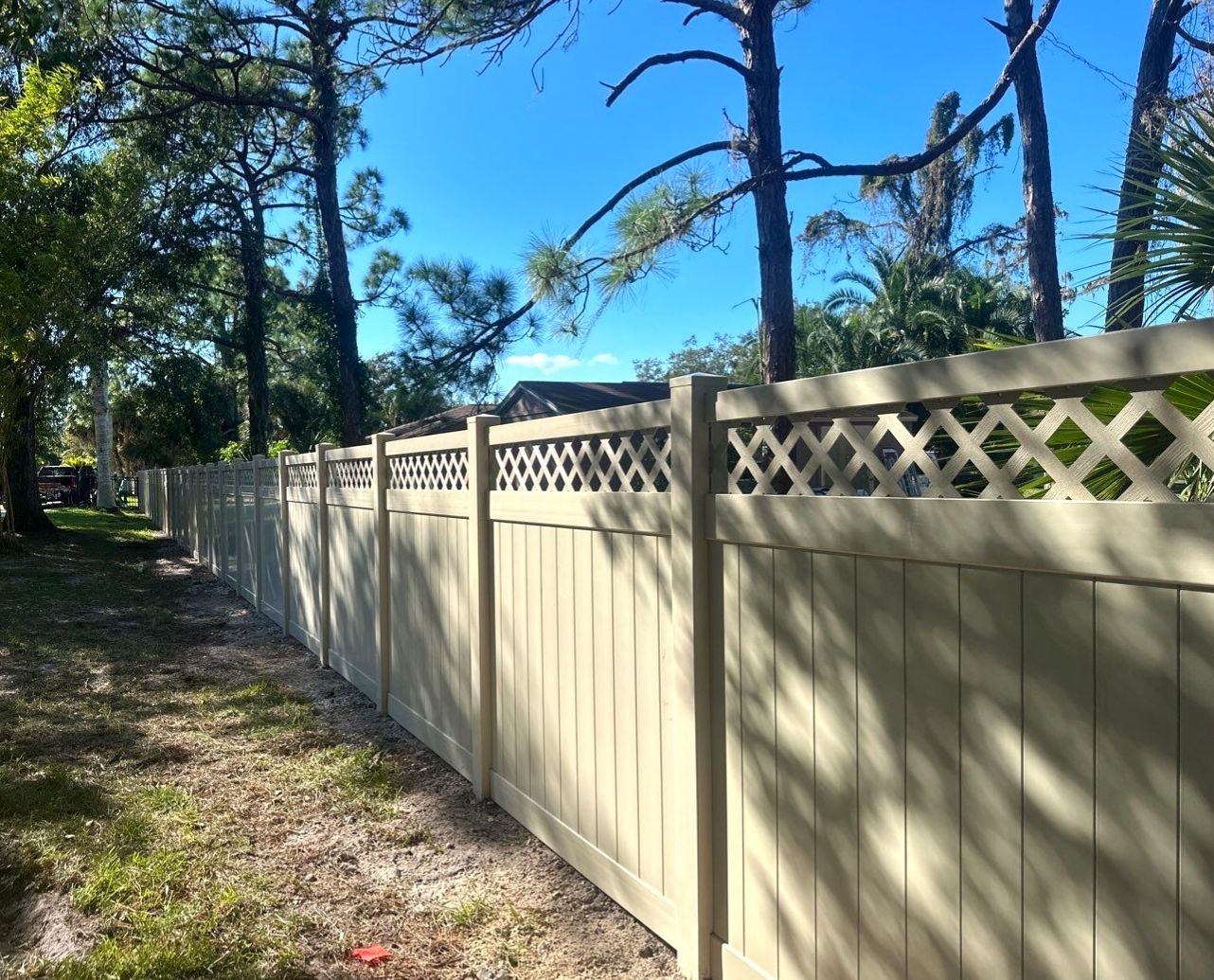 Vinyl Fence Installation using 6Ft Tan Vinyl Privacy Fence with Lattice Top by Asap fence and gates, LLC