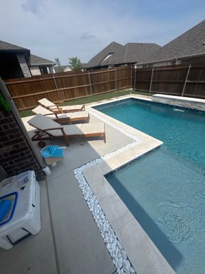 Sleek Geometric Pool with Tanning Ledge and Turf