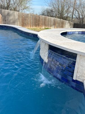 Freeform Pool with Raised Spa and Water Feature