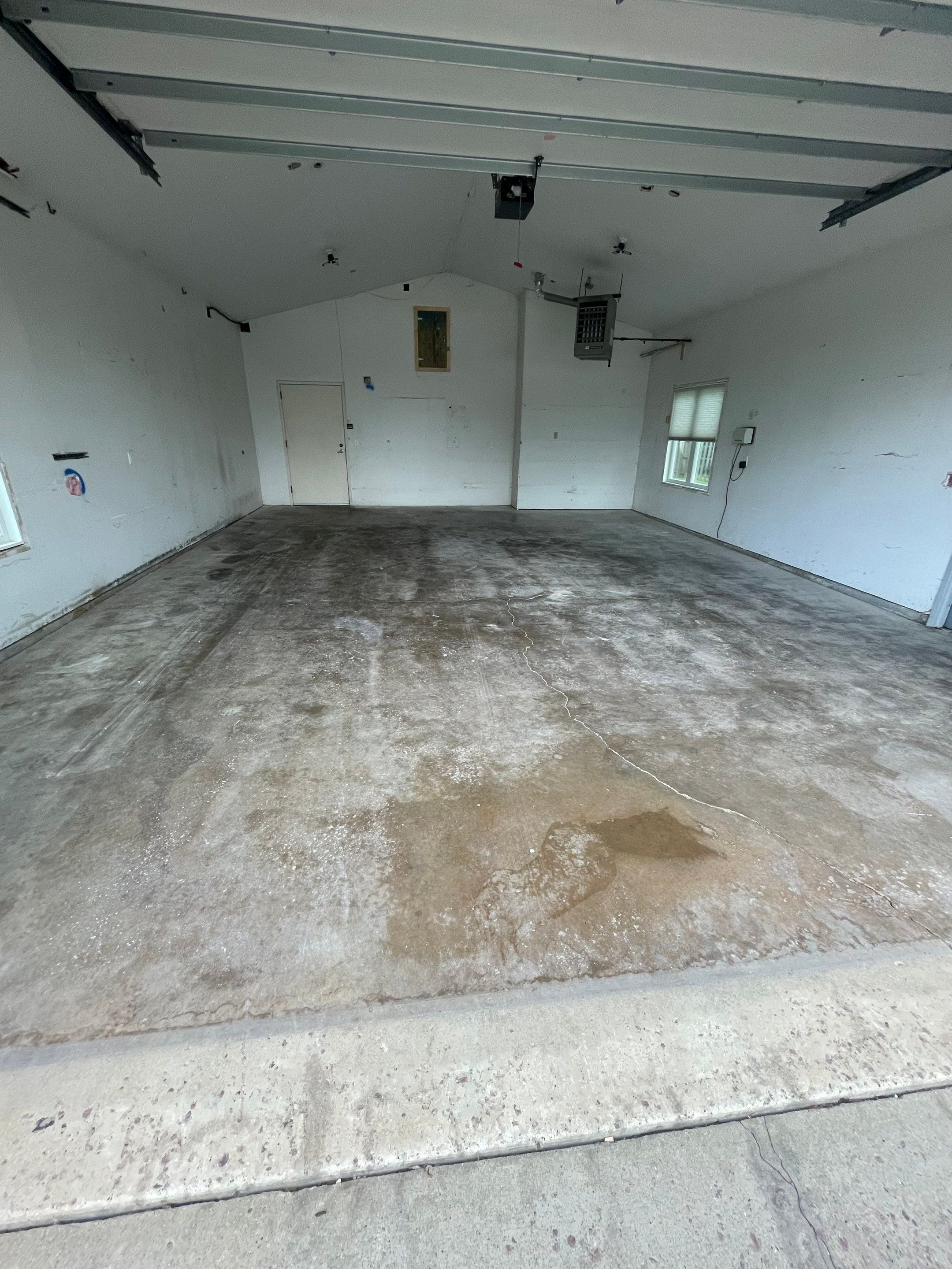 Coyote Flake Concrete Coating for Sioux Falls Garage by Select Painting, Coatings & Garage Cabinets