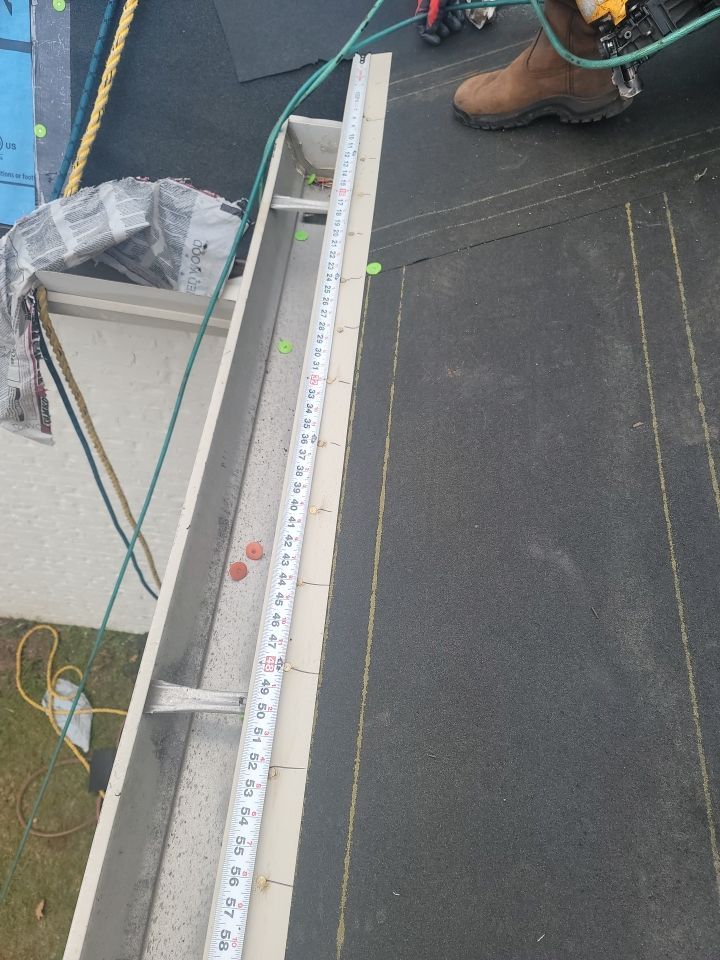 Residential Roofing Installation using Roof Replacement by American Roofing & Construction LLC