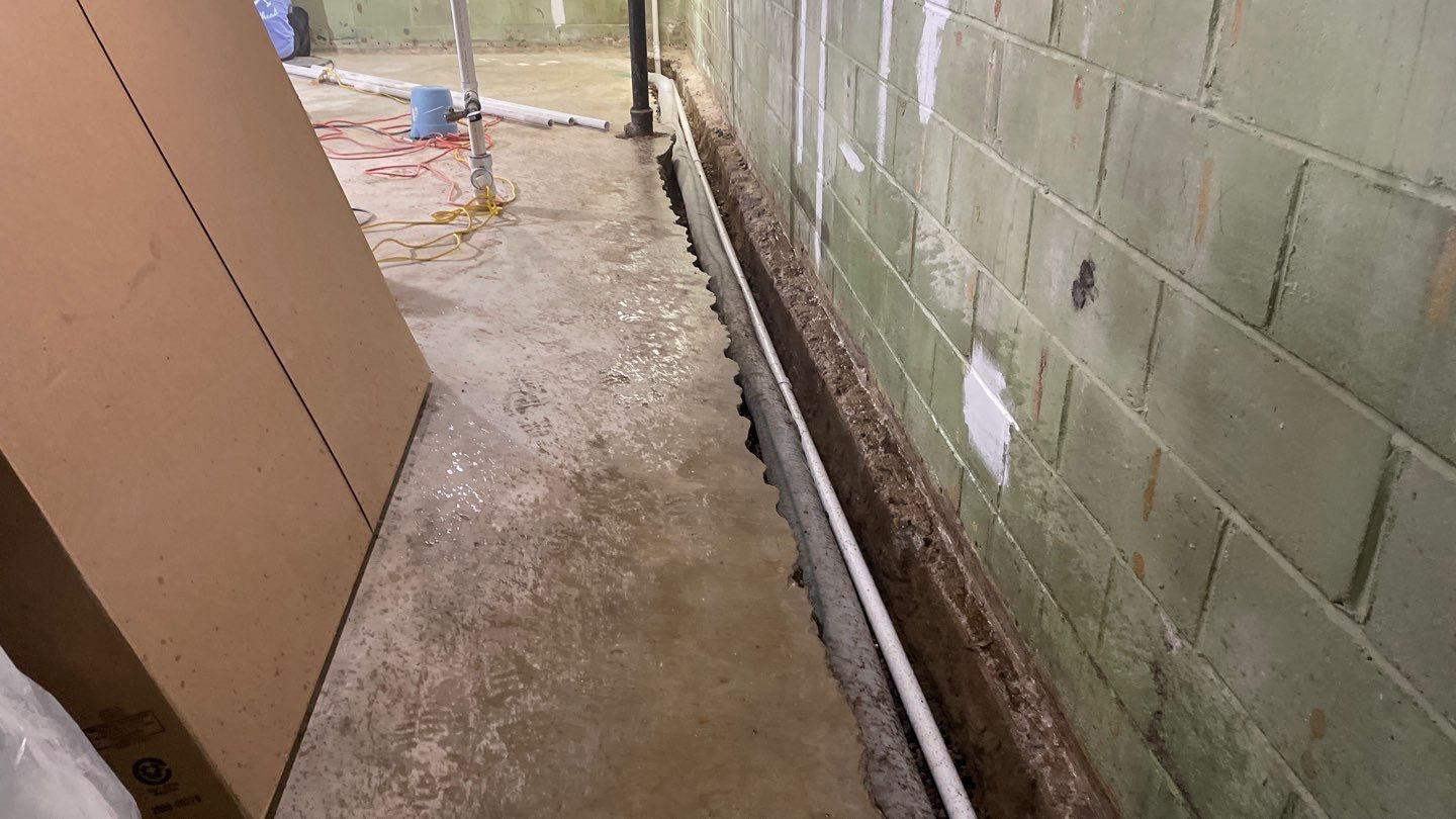Interior Drain Tile & Wall Drainage in Southwest Minneapolis by Waterproofing Northeast