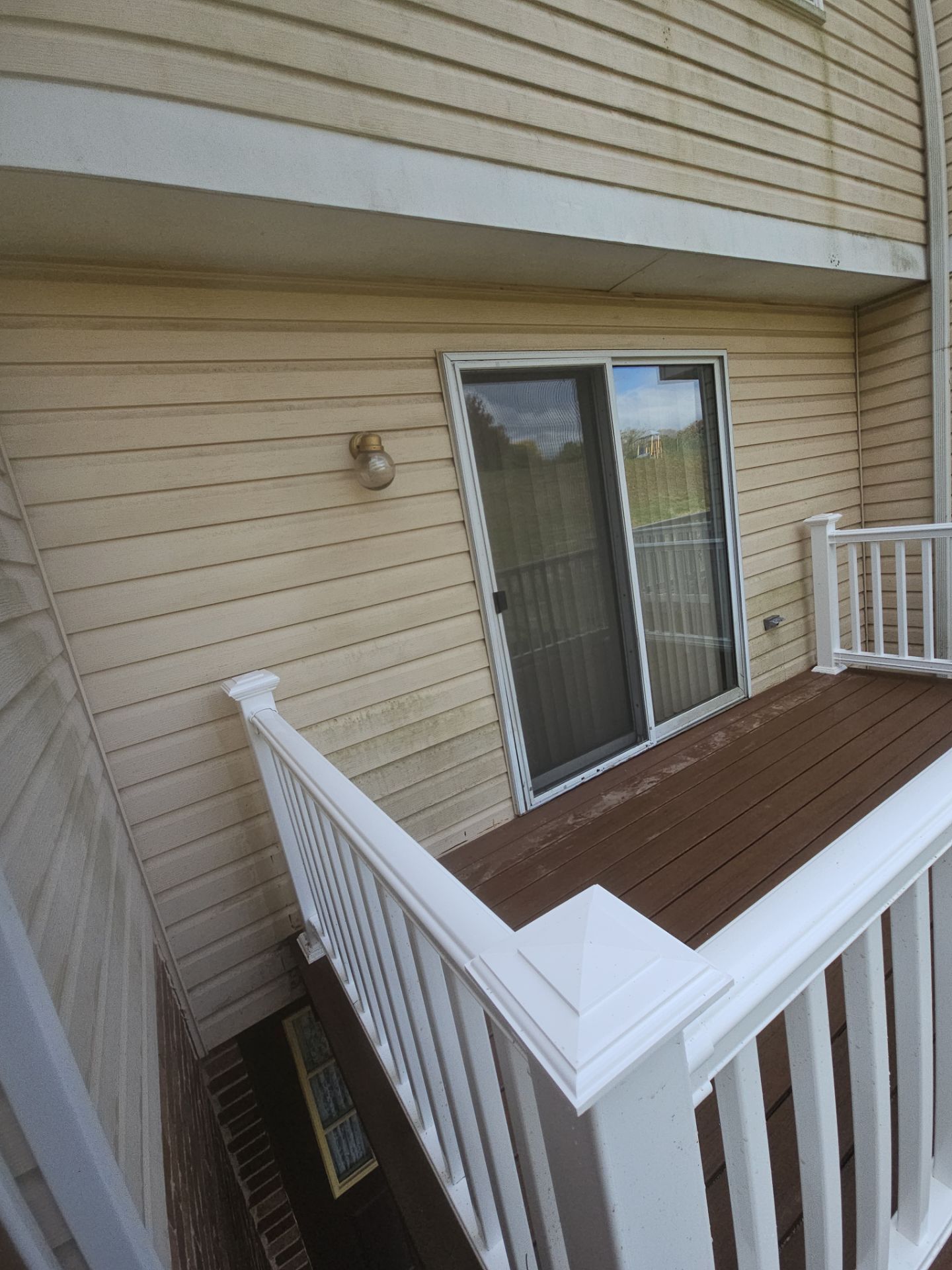Stamped concrete and redeck  by Cousins Roofing Siding & Decks