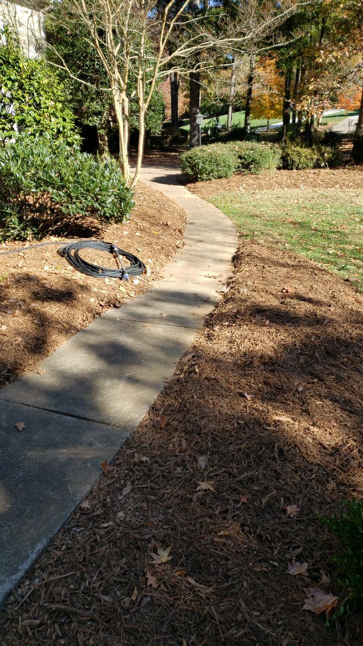 Driveway Clean using cleaner by Power Wash Masters LLC