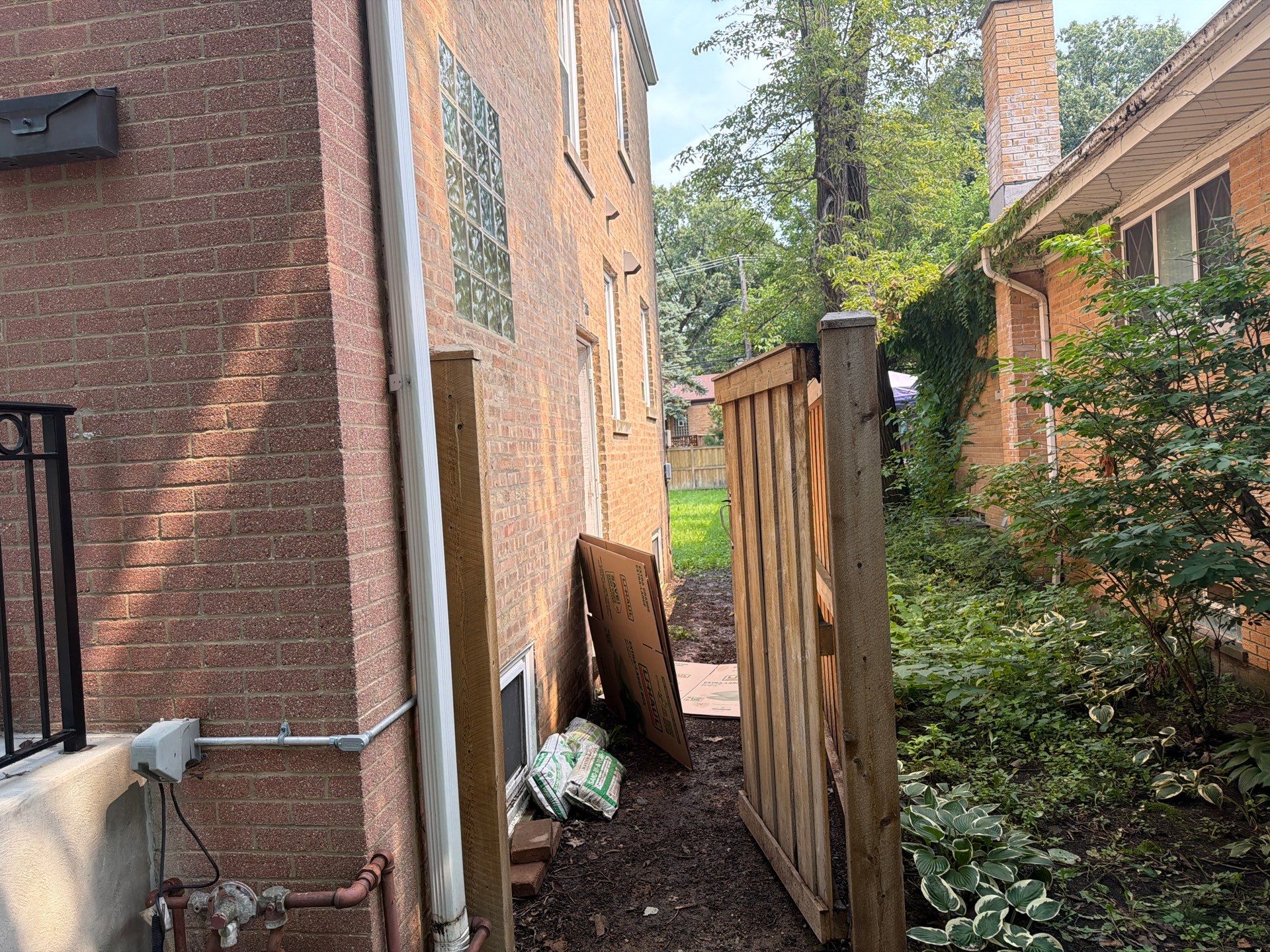 Wood fence cleaning and sealing by Northern Power Washing LLC.