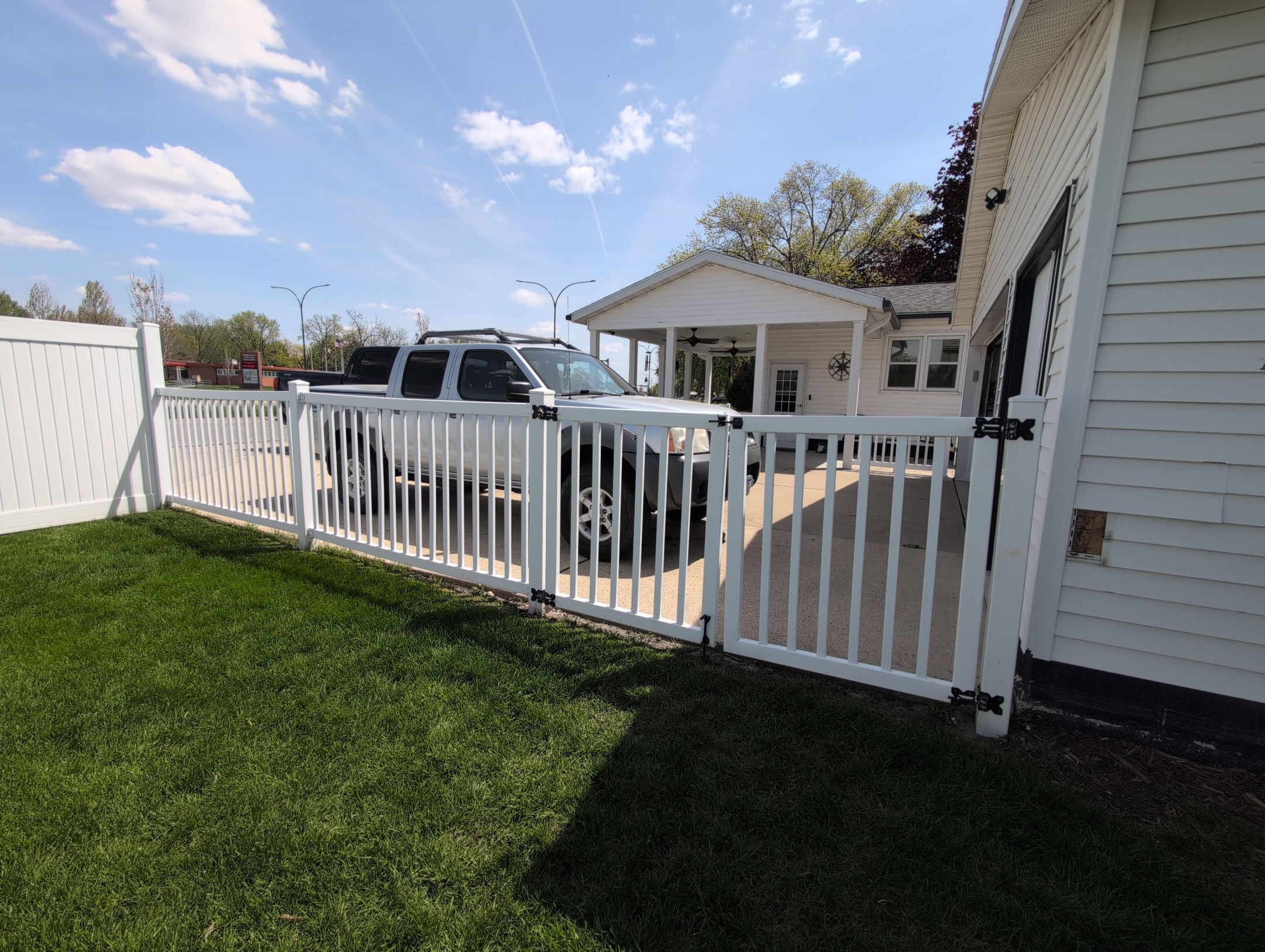 White Vinyl Privacy and Picket Fence Installation in Waterloo by Perfect Picket Fence and Stain