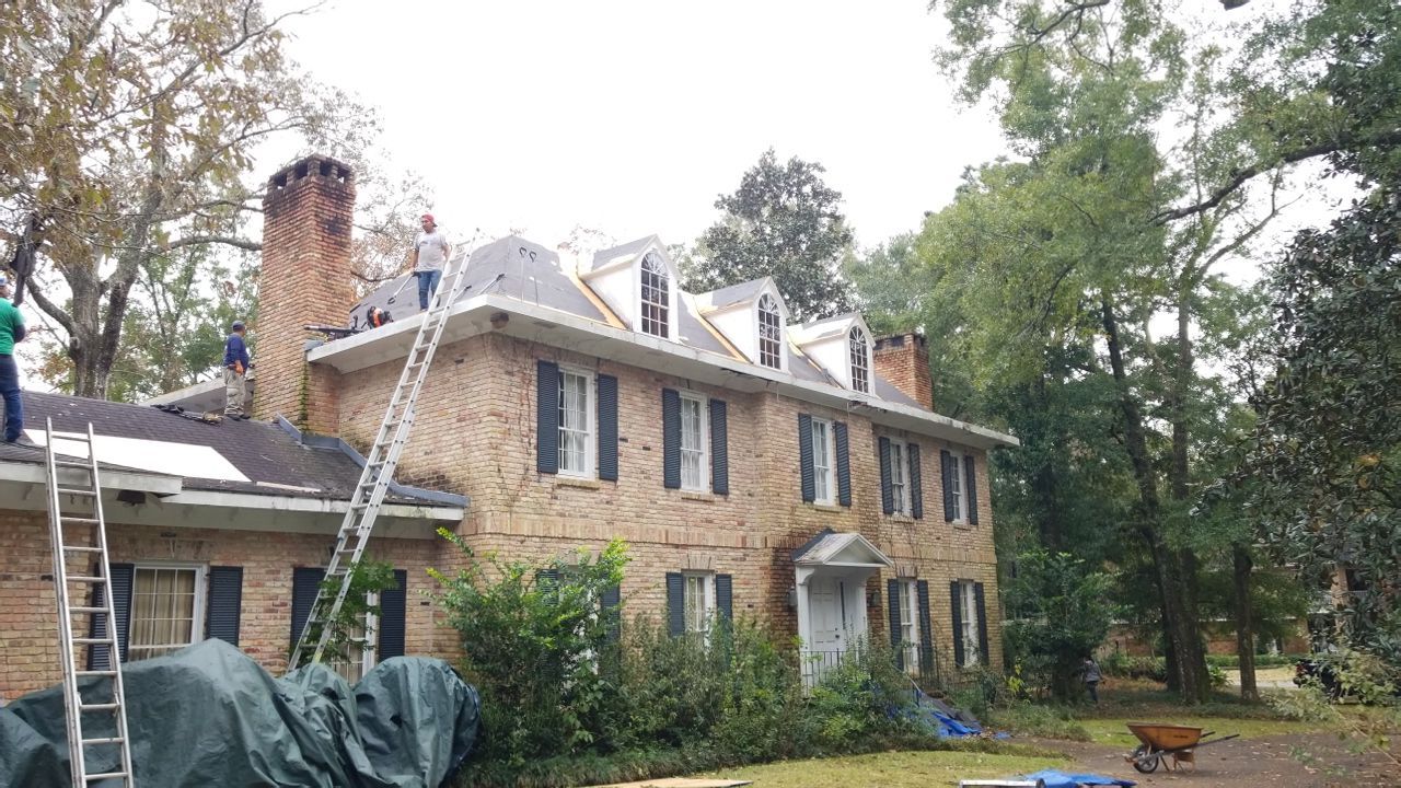 Residential Roofing Installation using Roof Replacement by American Roofing & Construction LLC