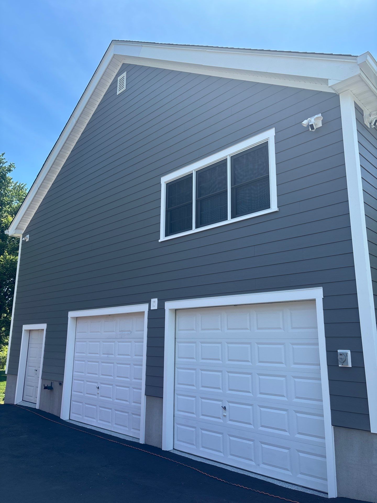 Valhalla Home Exterior Siding Remodel and Custom Window Trim Installation by Ideal Siding 