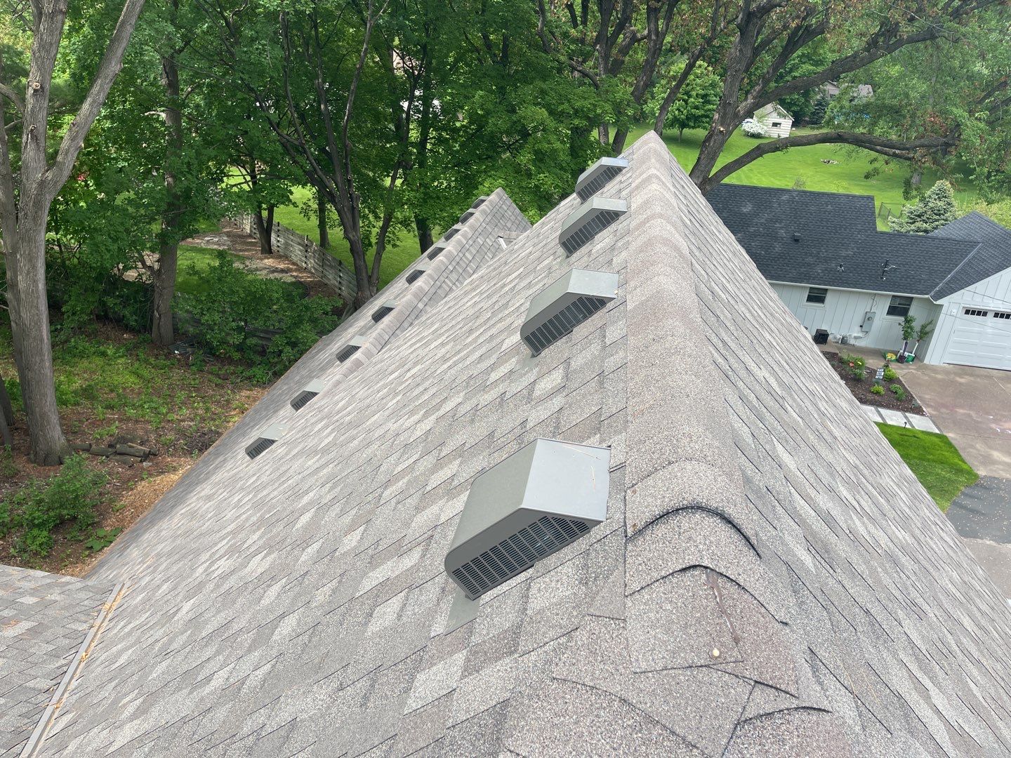 Chanhassen, MN – Roof Replacement with Gutter Guard Upgrade by First Impressions Exteriors