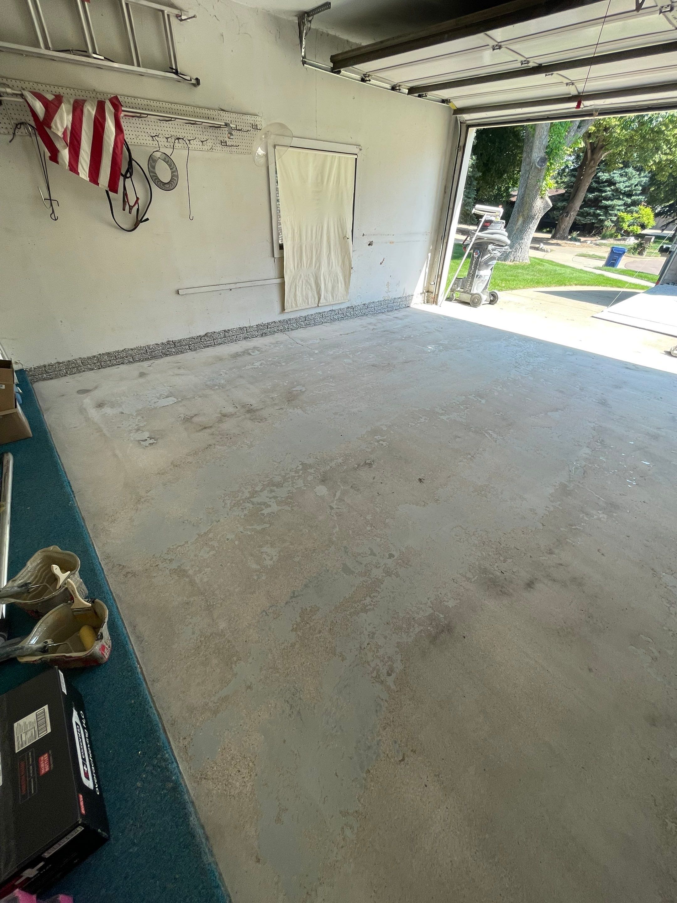 Custom Creekbed Garage Floor Coating in Sioux Falls by Select Painting, Coatings & Garage Cabinets