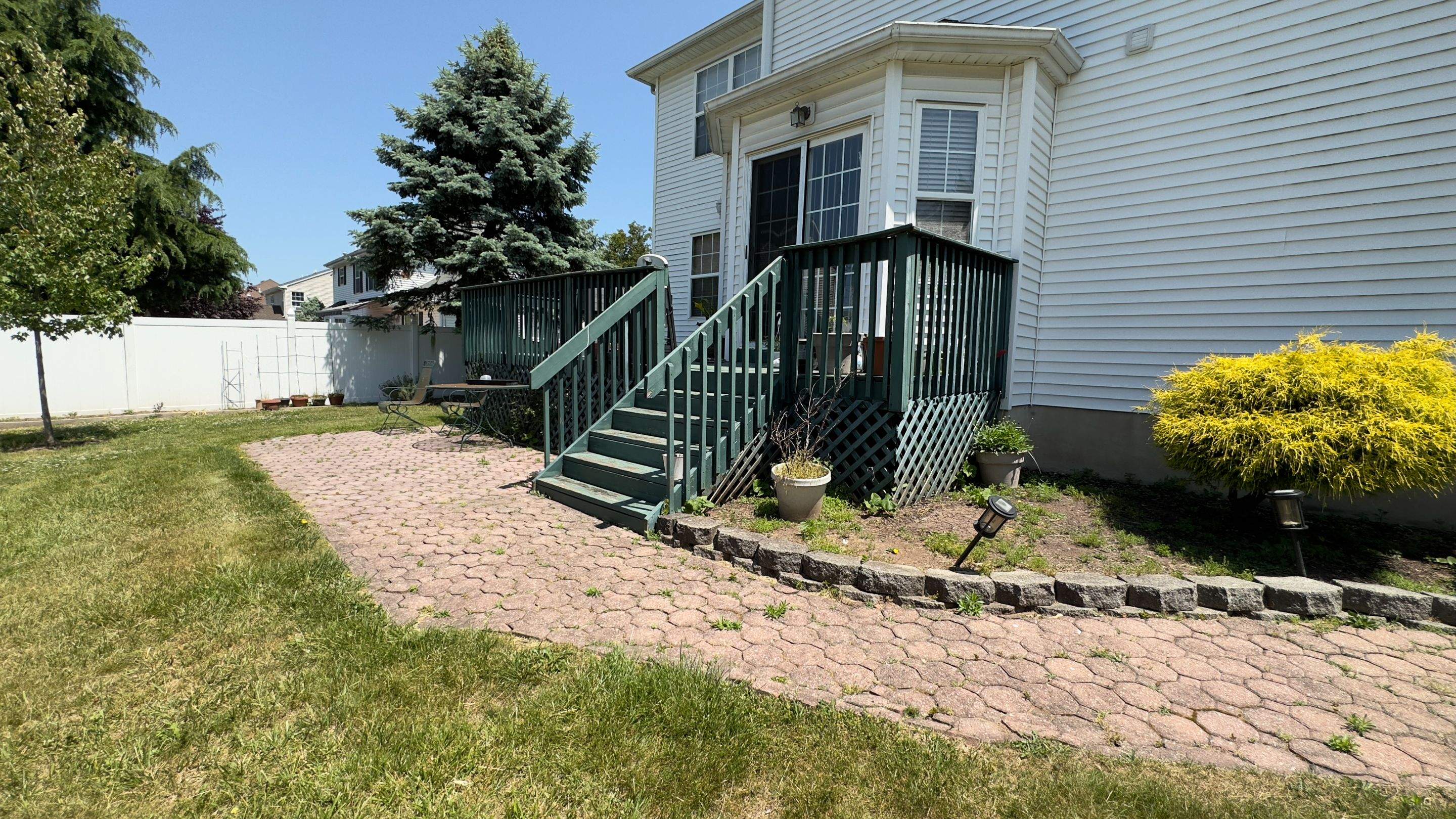 New Deck with Pergola and Vinyl Lattice by deck guardian