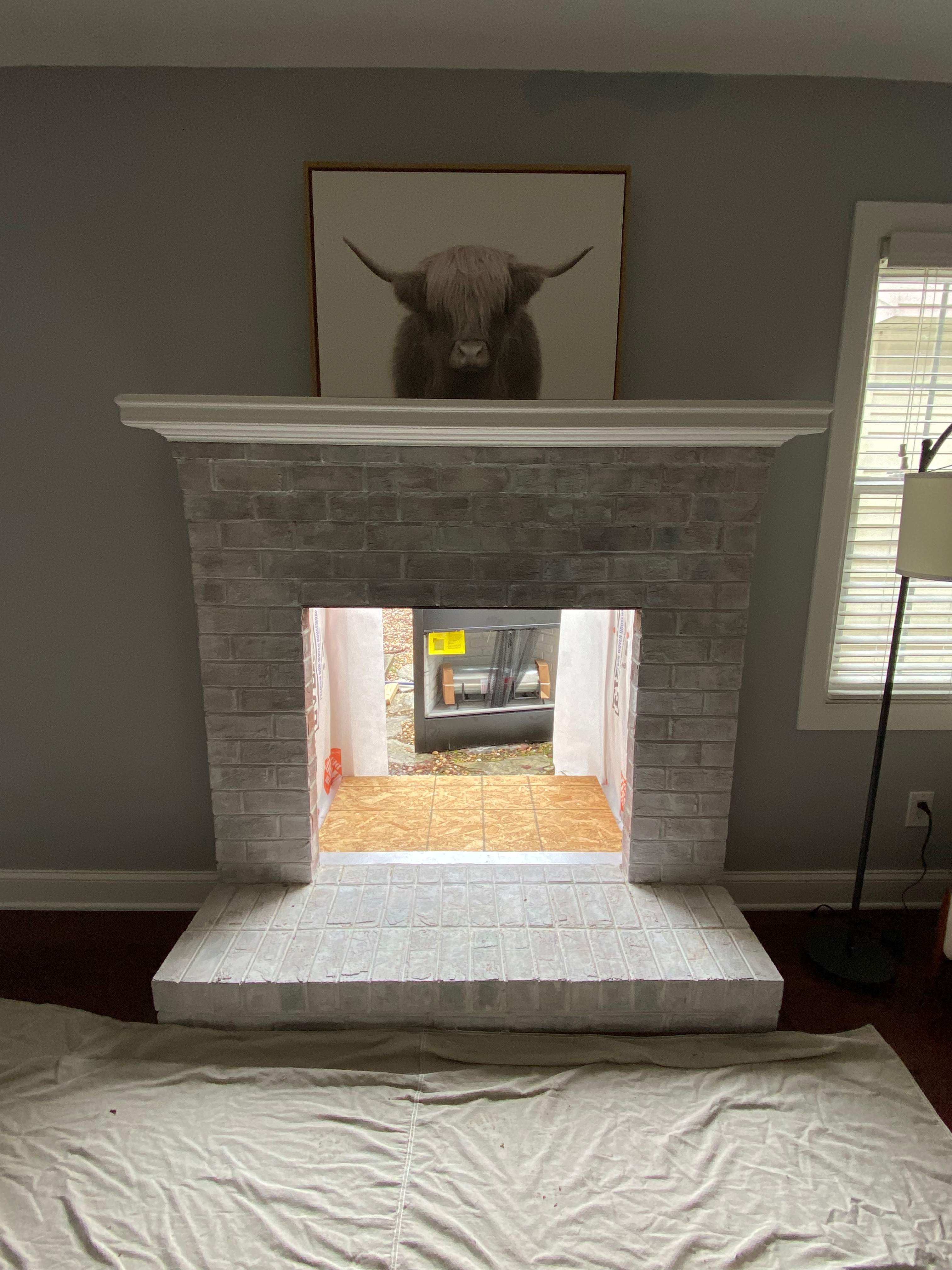 Wood Prefab Fireplace Replacement in Virginia Beach by Premier Chimney and Roofing