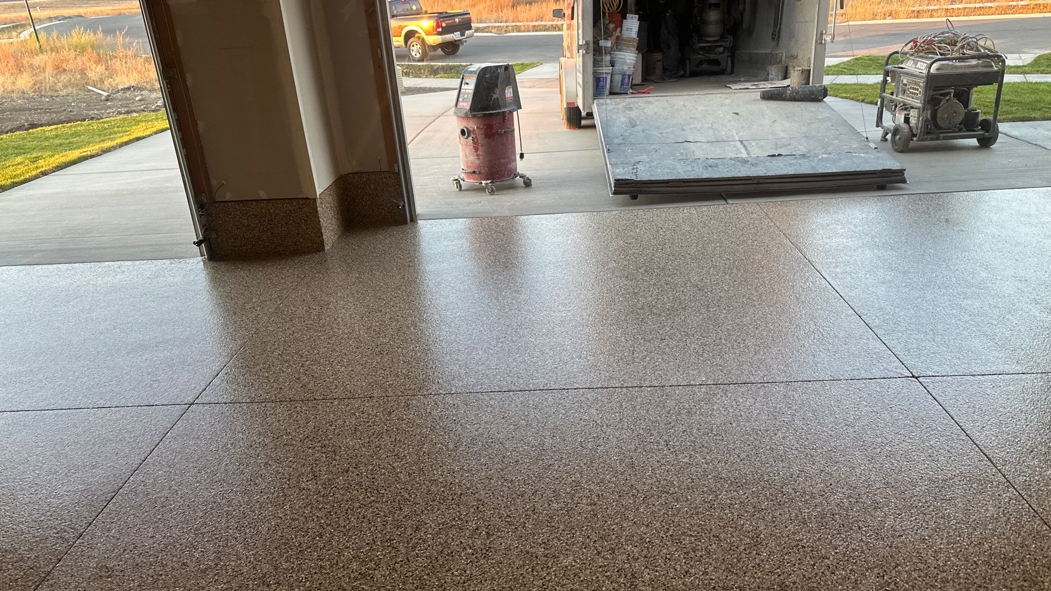 Garage Transformation using Sandstone by Croc Coatings, LLC