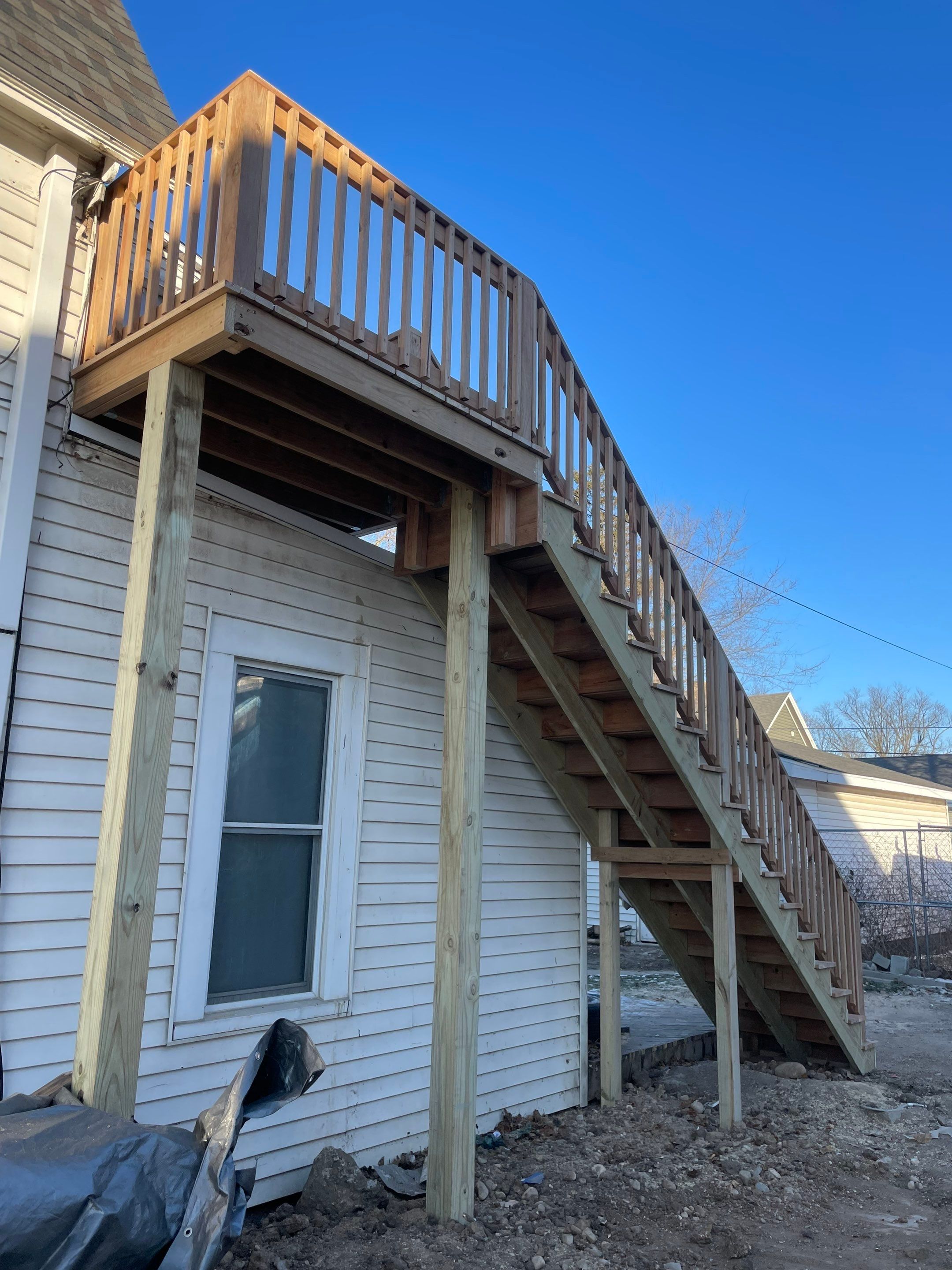 Deck Installation using Treated Lumber by Avalon Roofing and Exteriors