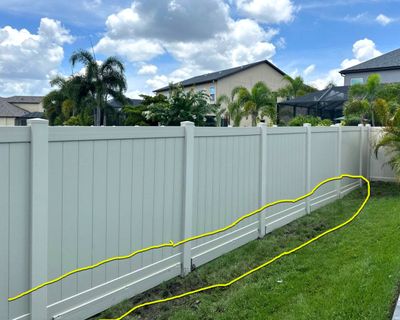 Vinyl Fence Installation using Tan Vinyl Privacy Fence