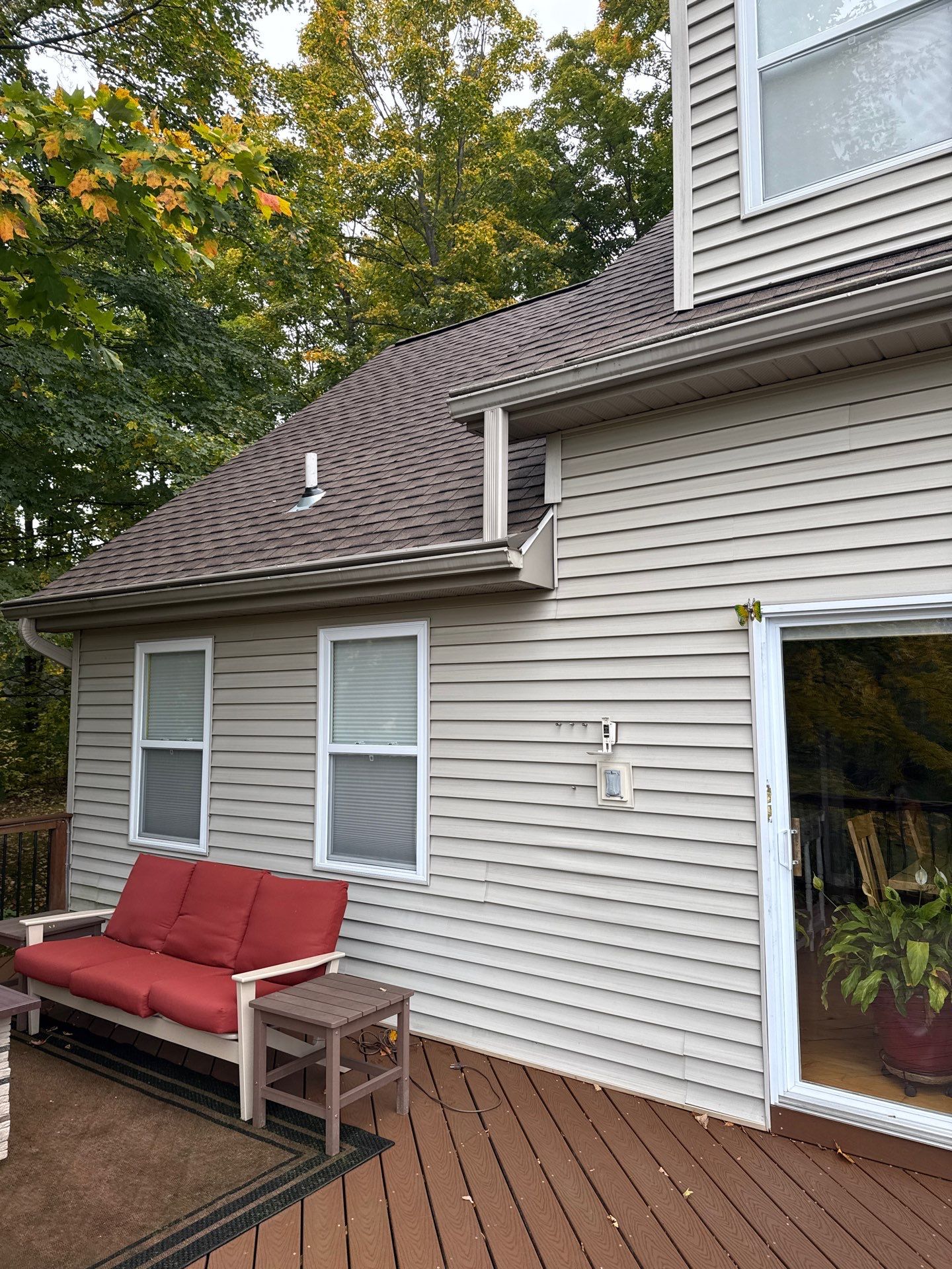 Traverse City Gutter Helmet Installation on a Shingled Roof Home