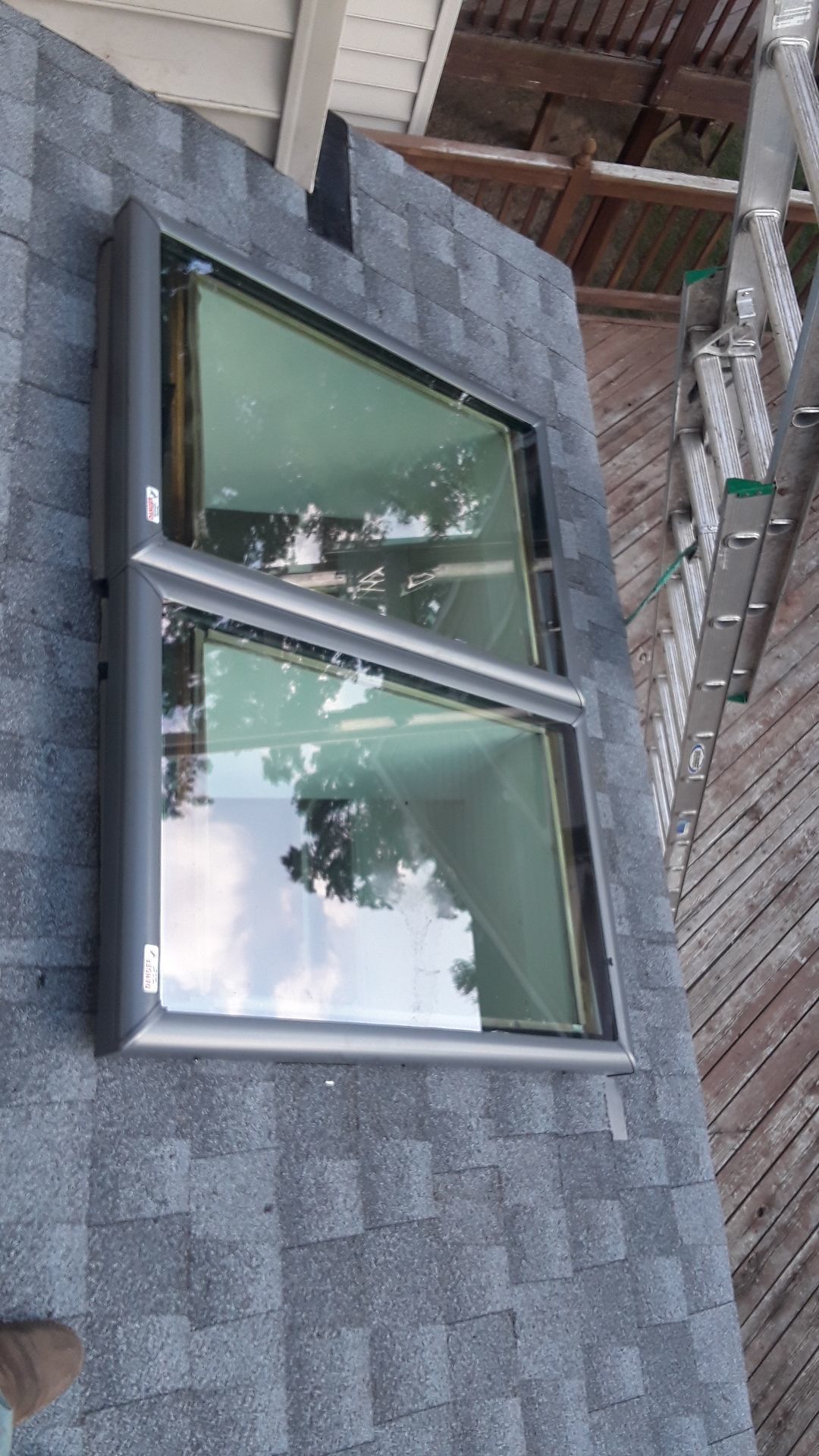 Roof, Window, and Skylight Replacement by American Home Contractors