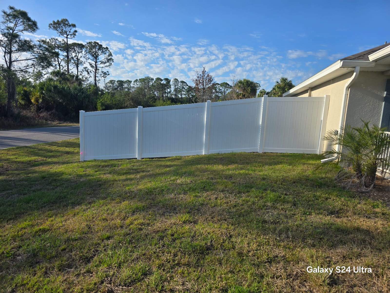 Residential White Vinyl Privacy Fence Installation in North Port by True Fence LLC