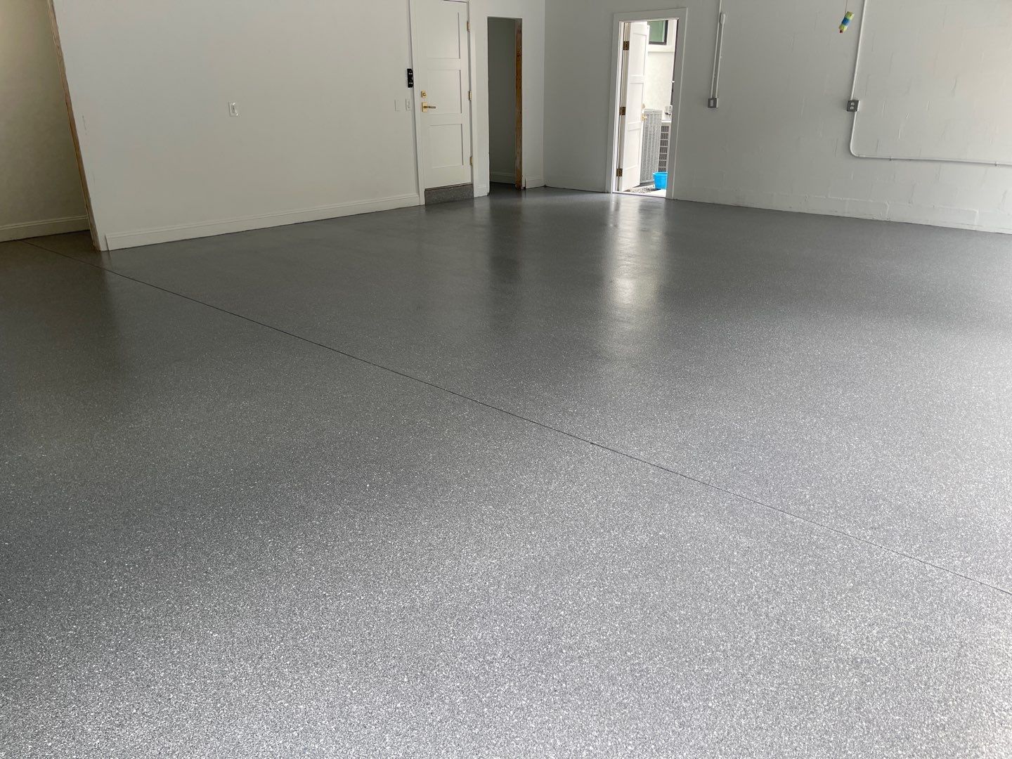 Garage Project in Gainesville, FL in Hybrid Turquoise  by Cross Creek Concrete Coatings