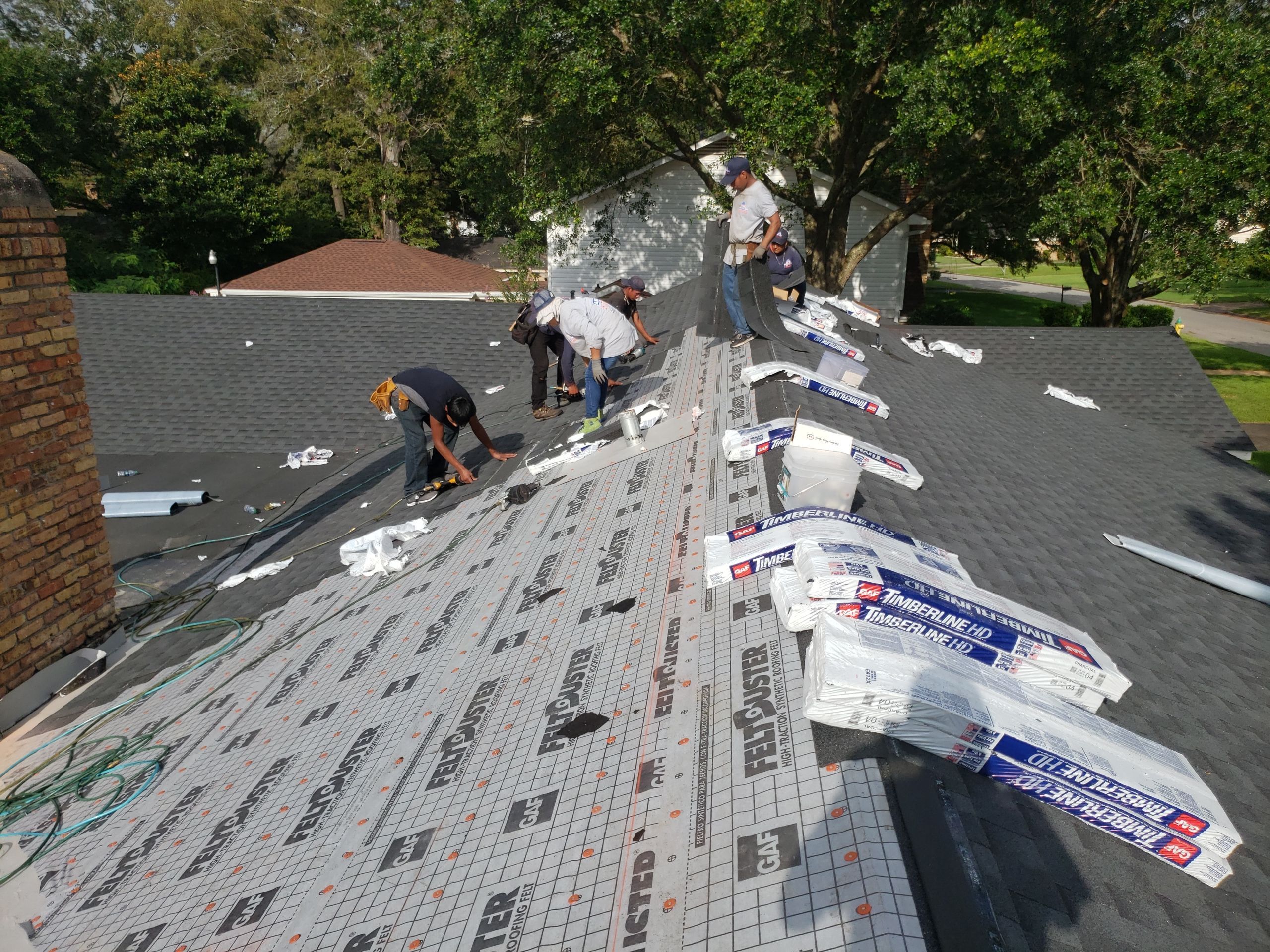 Residential Roofing Installation using Roof Replacement by American Roofing & Construction LLC