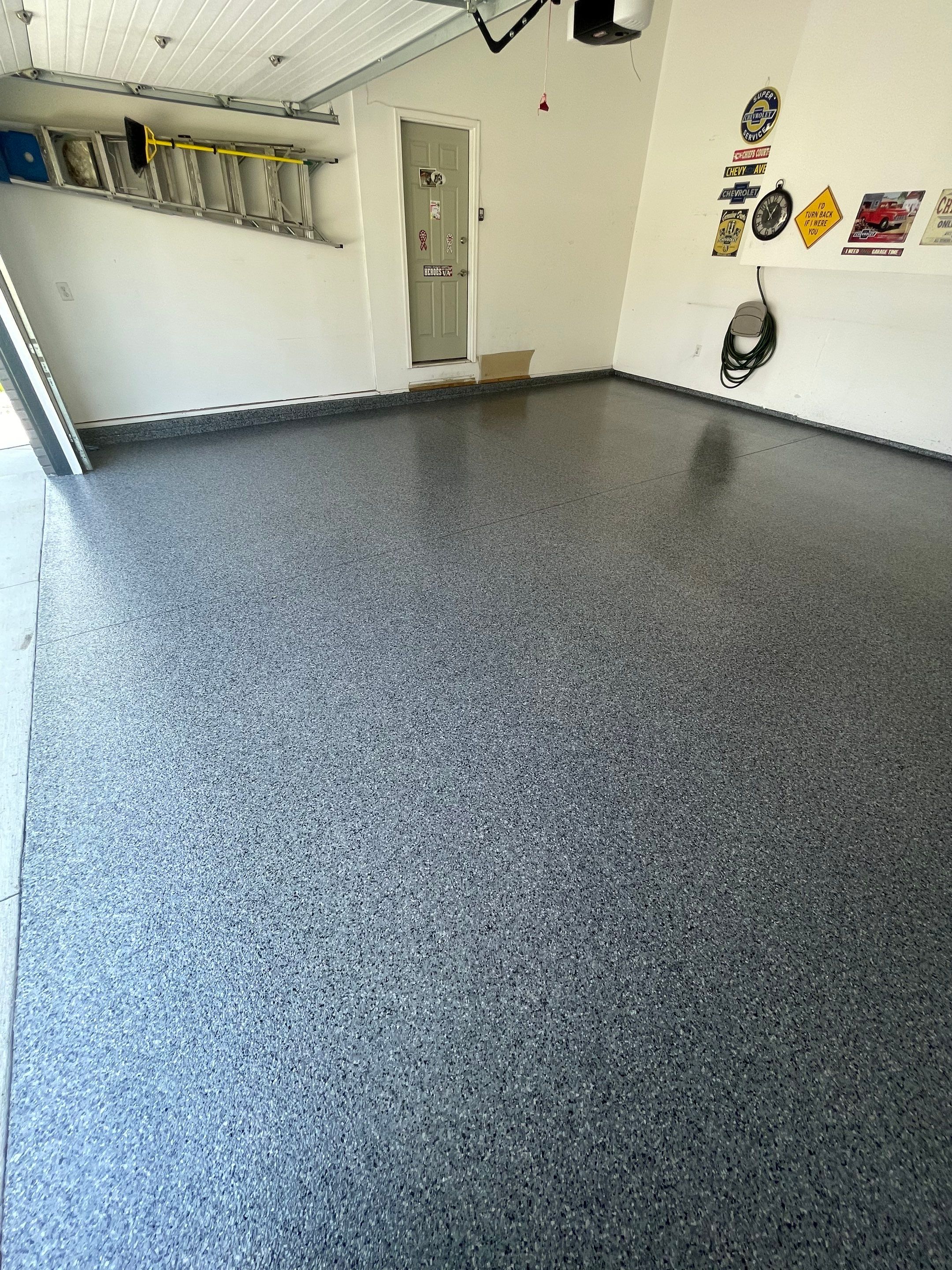 Sioux Falls Garage Floor Coating with Nightfall Decorative Chips by Select Painting, Coatings & Garage Cabinets
