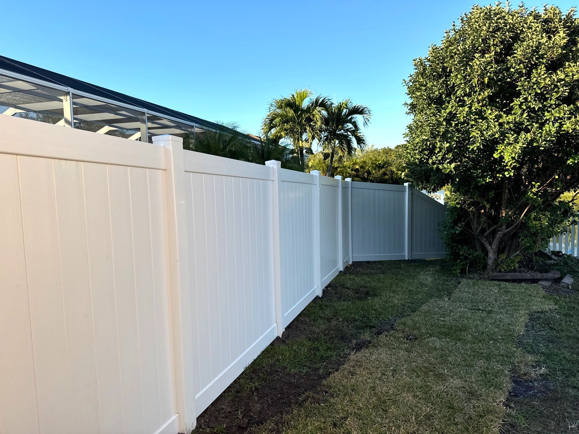 Vinyl Picket Fence Installation using 6Ft White Vinyl Privacy Fence with a 4Ft White Clearwater Picket Fence by Asap fence and gates, LLC