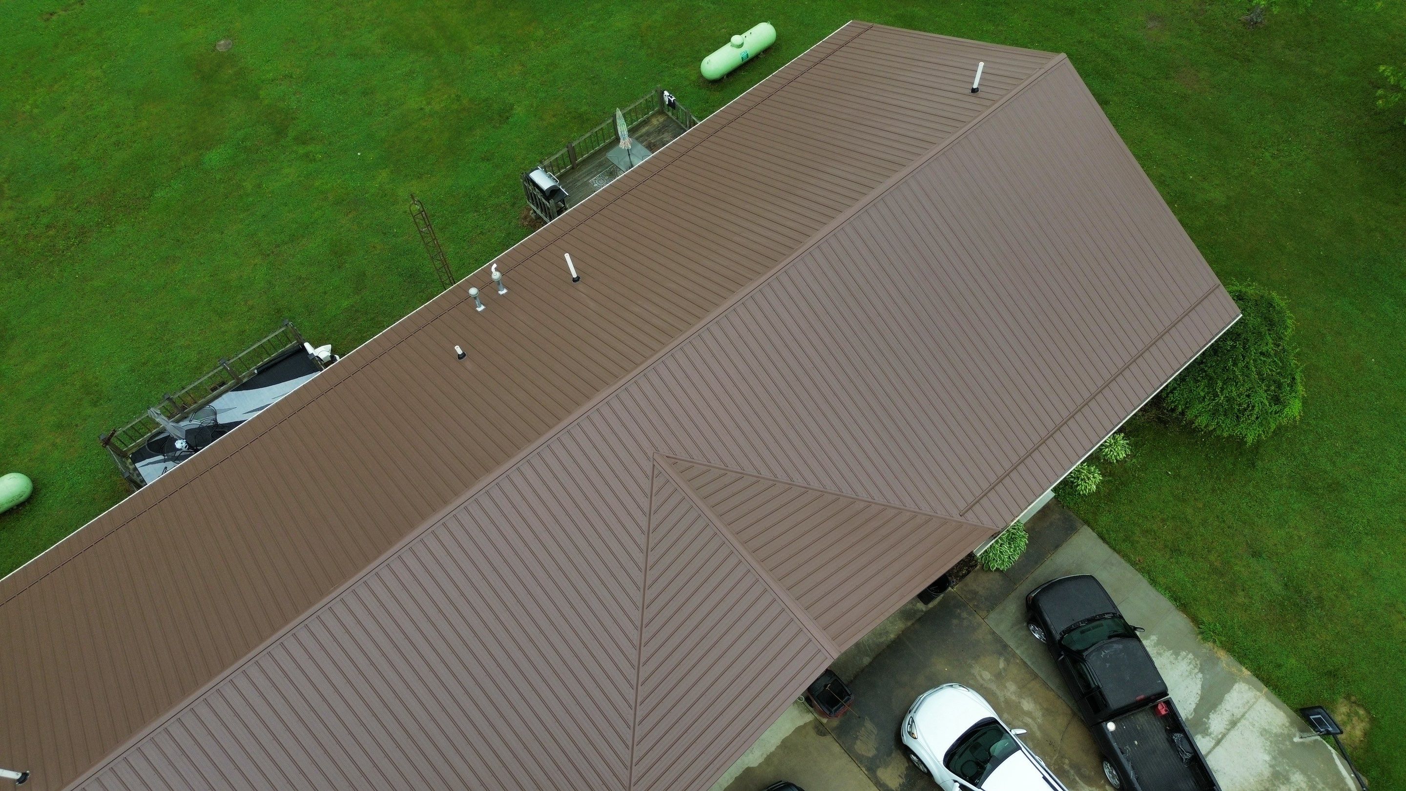 Residential Roofing Installation using Performance Panel Metal - Coca Brown by RoofX 