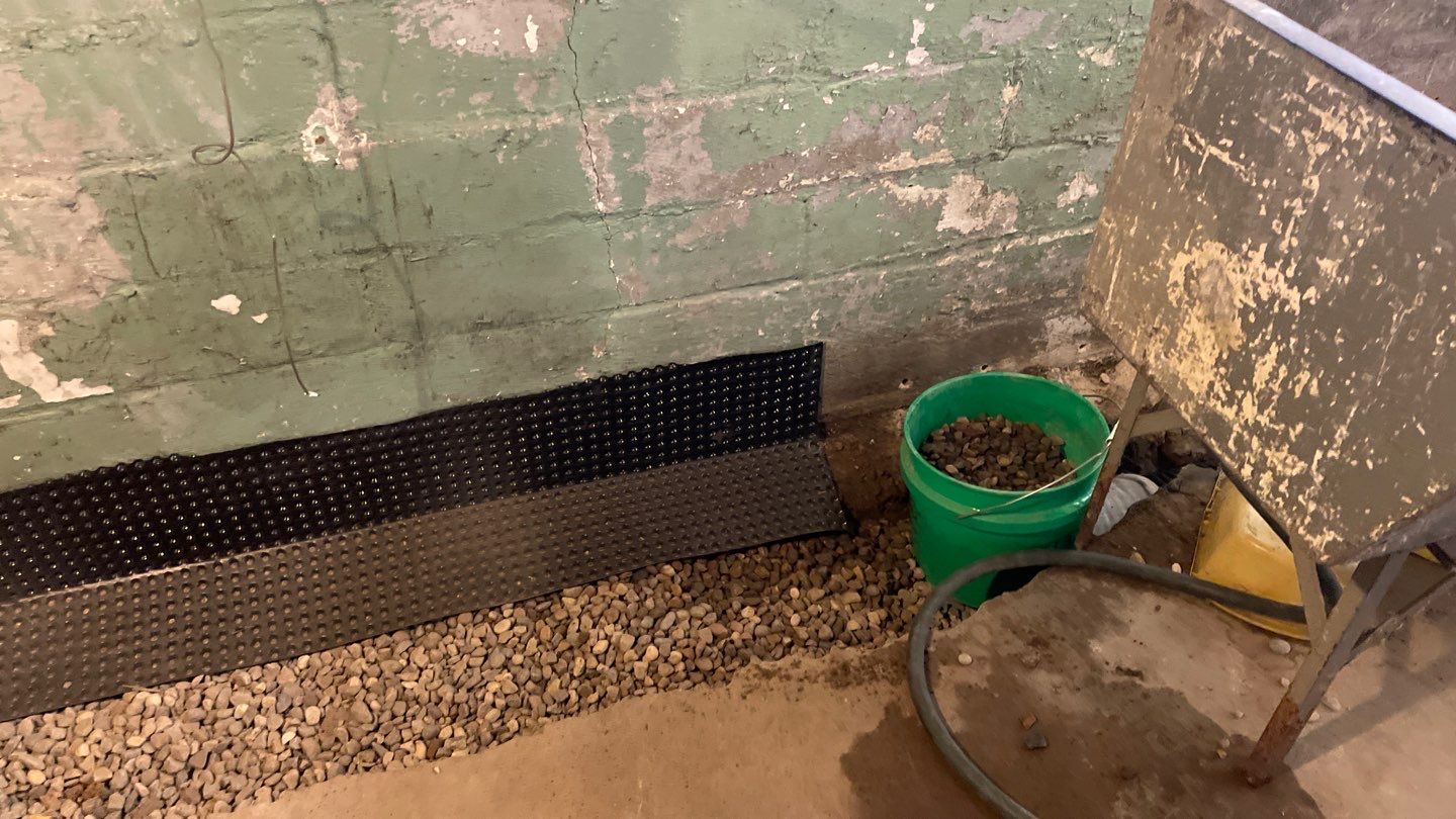 Interior Drain Tile for a South Minneapolis Basement by Waterproofing Northeast