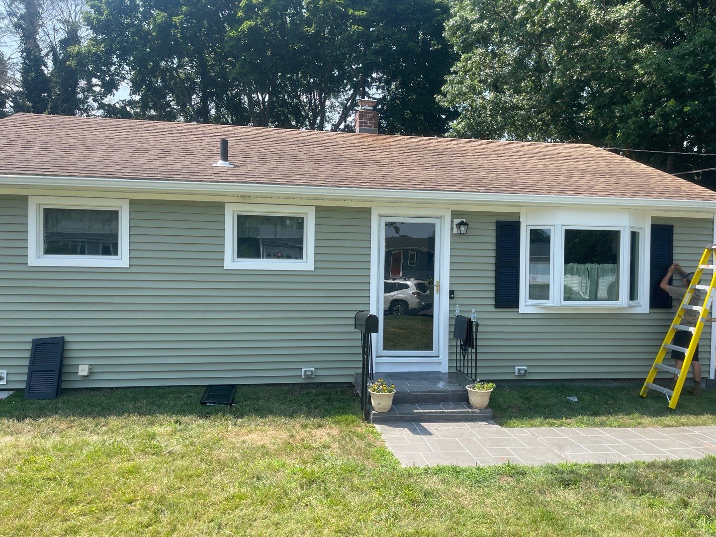 Siding Installation using Clapboard Monogram D4 Cypress by A Plus Exterior