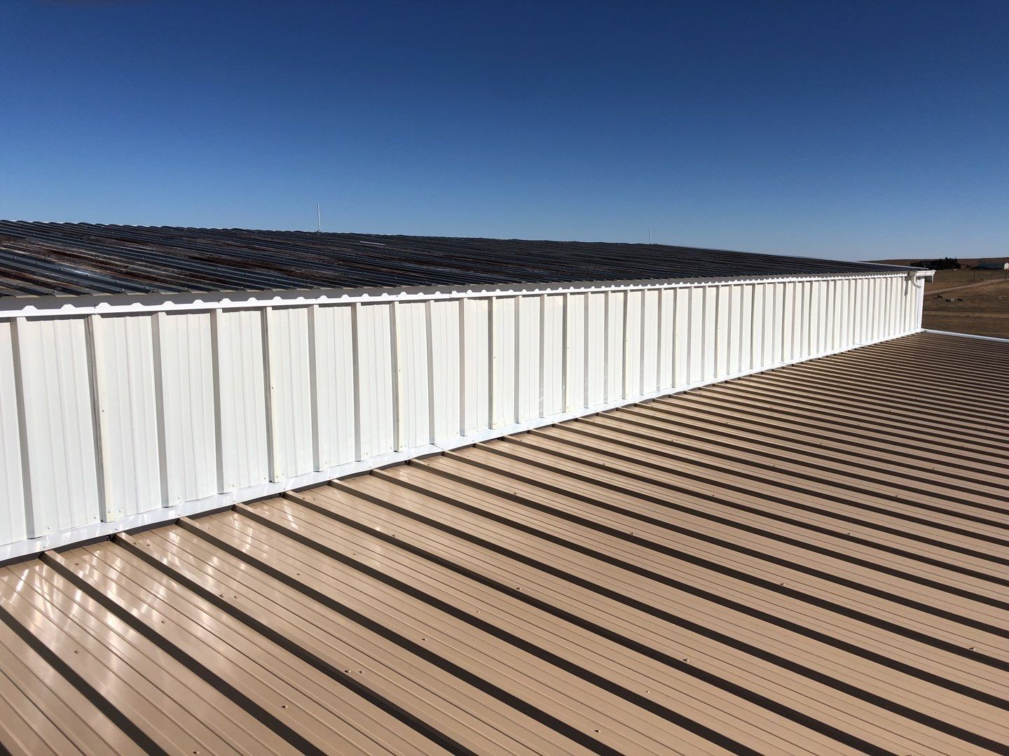 Residential Roofing Installation using Metal roofing by American Roofing & Construction LLC