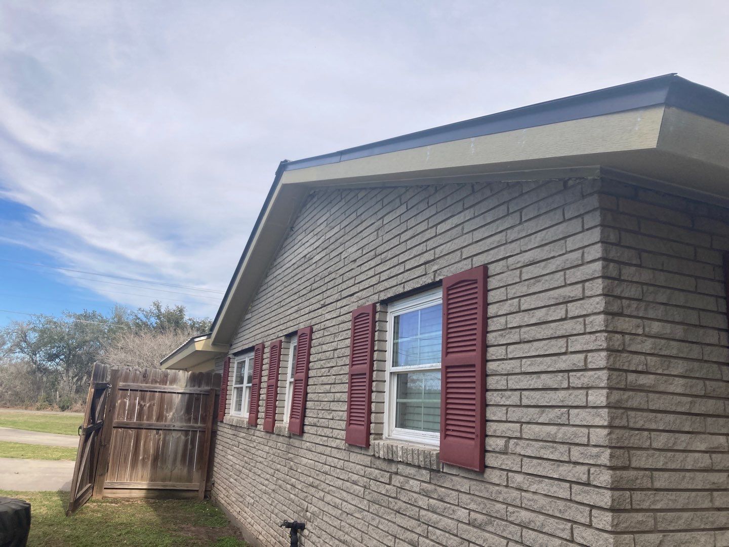 Beeville Backporch sittin' by Bayfront Roofing and Construction