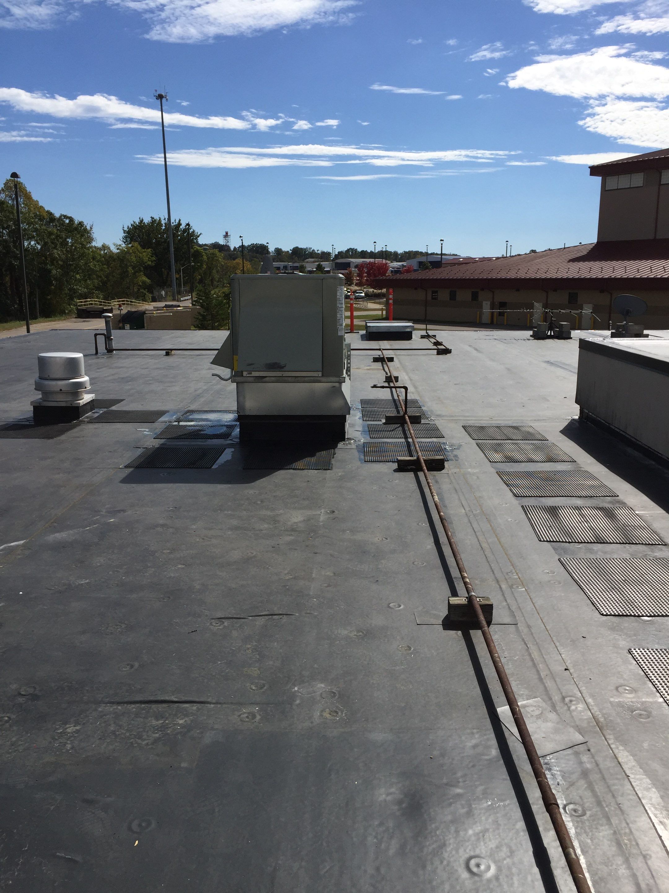 Commercial Rubber Roofing  using Carlisle Rubber Roofing System by Secure Construction Company Inc
