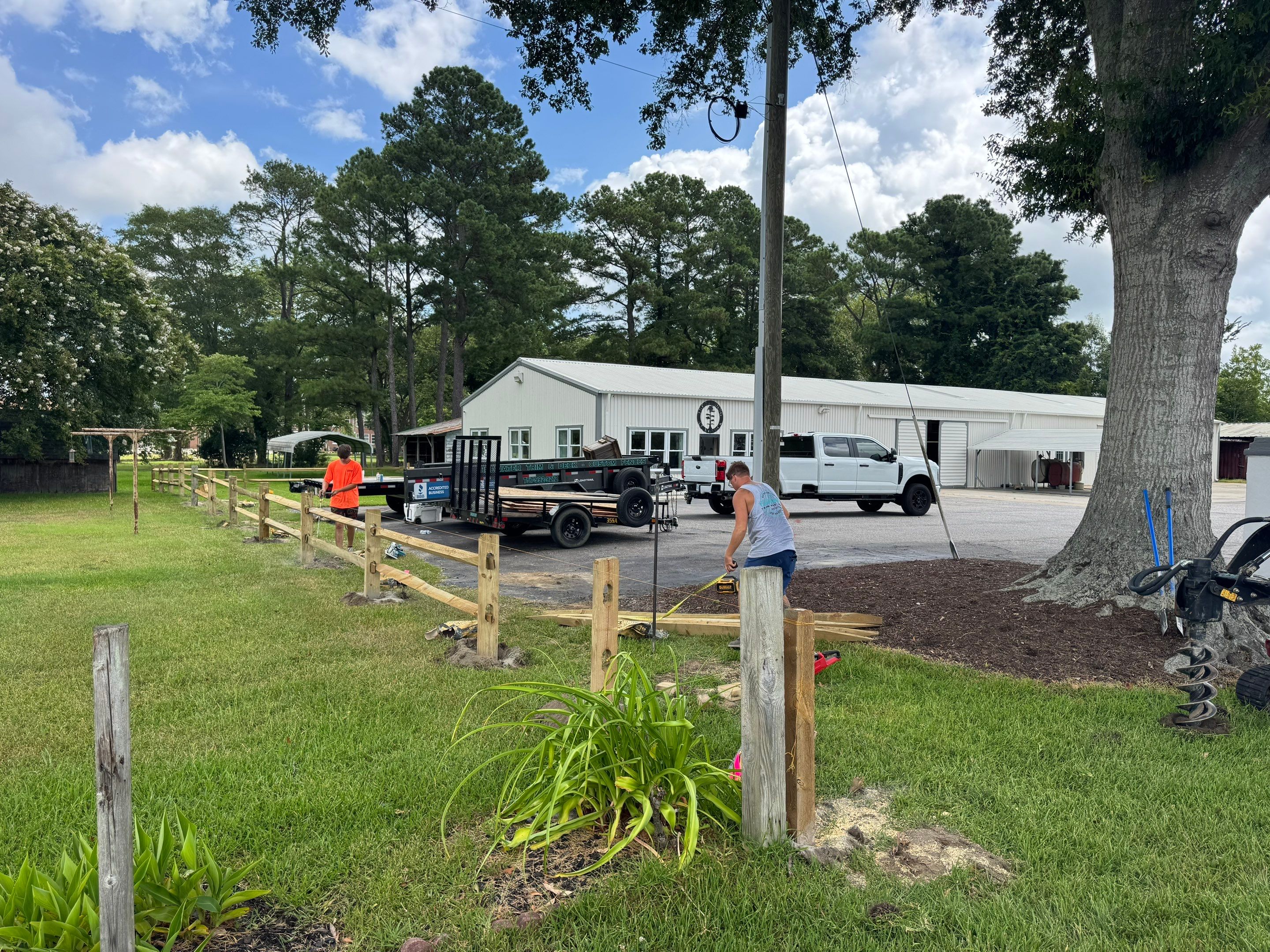 The Fence That Welcomes You Home by Tidewater Trim & Deck