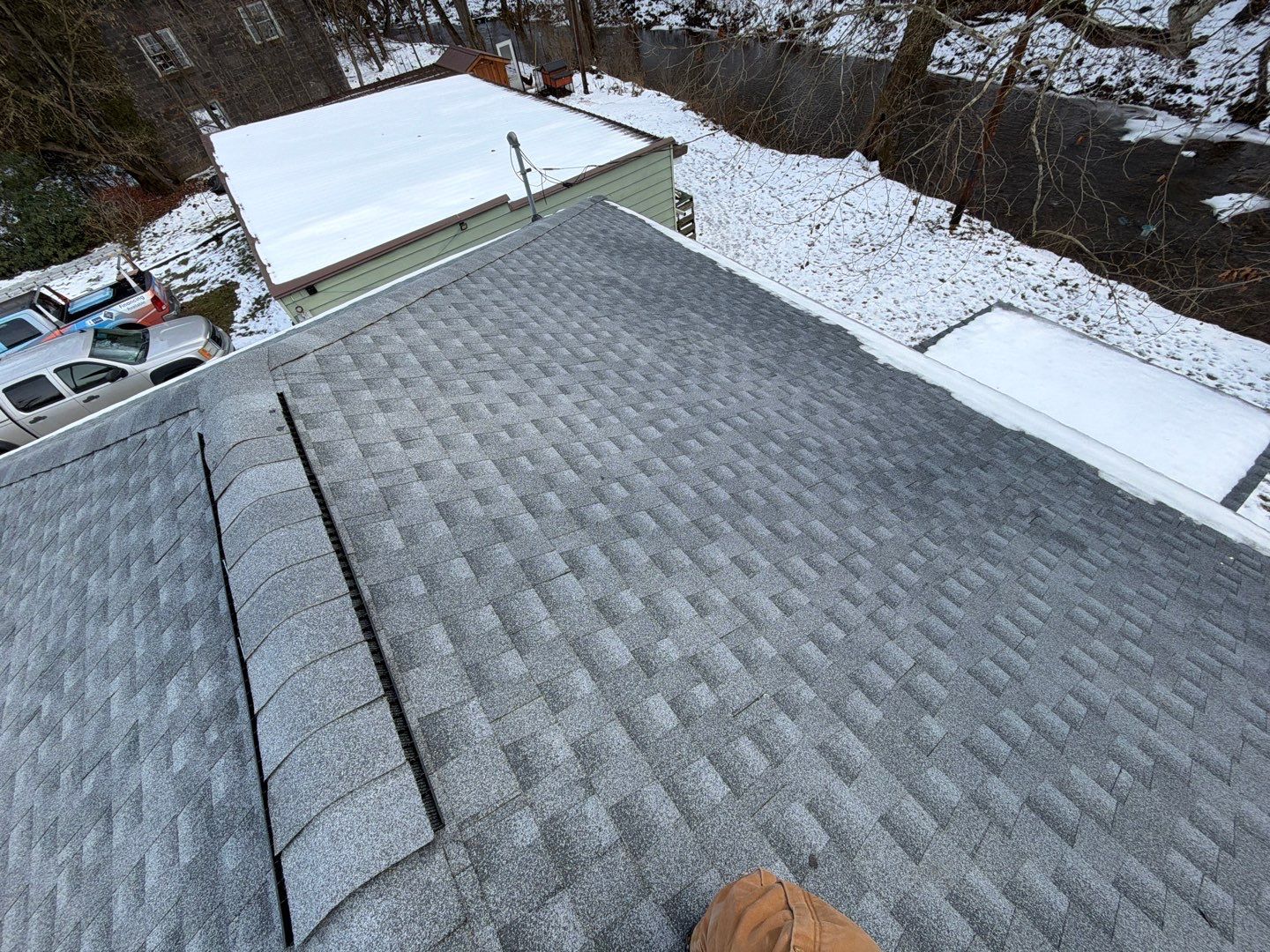 Residential Roofing Installation using GAF Timberline HDZ Oyster Grey by Rainstoppers Roofing