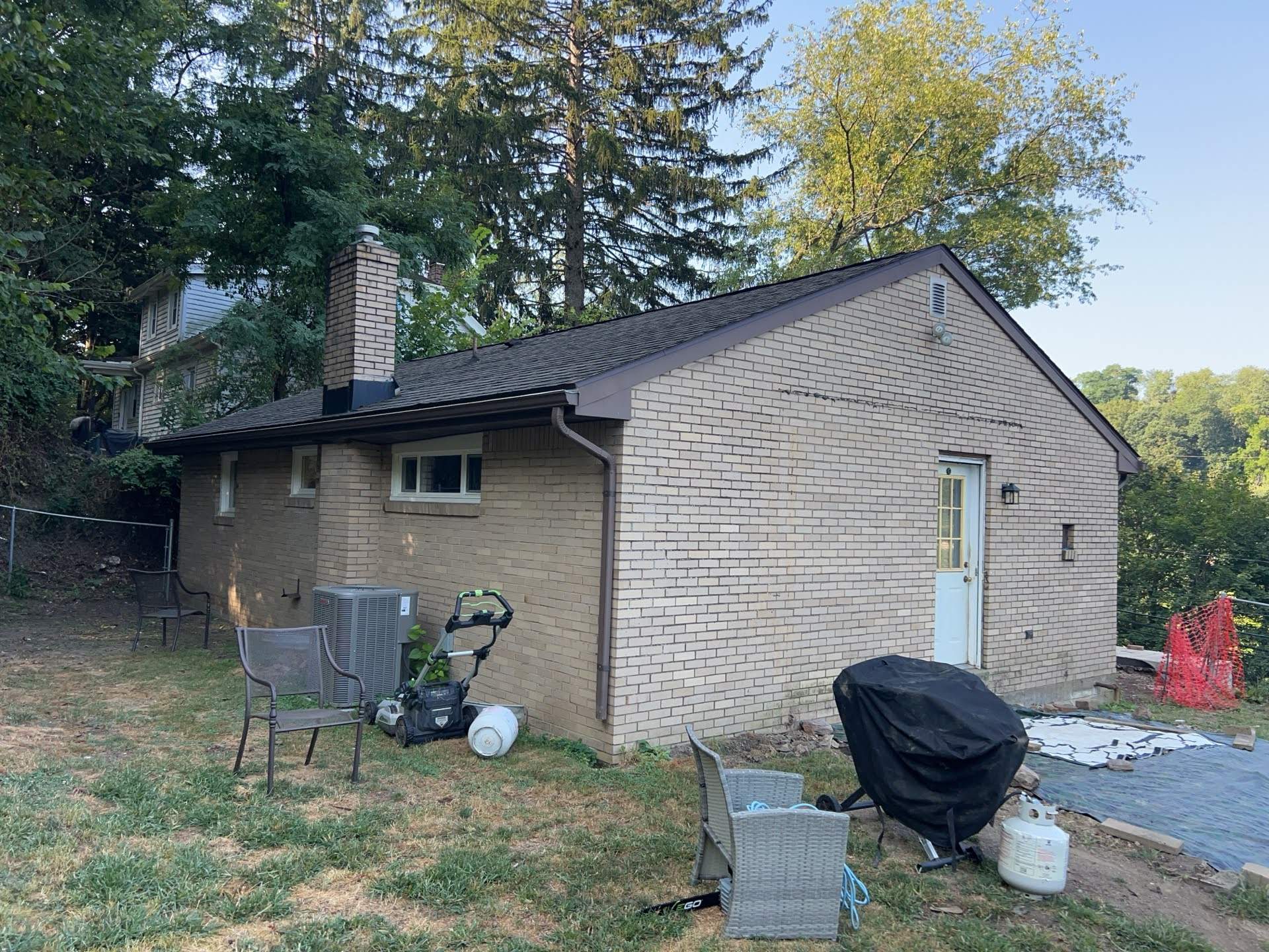 White Brick Exterior Painting and Dark Trim Transformation in Pittsburgh by Ideal Siding Pittsburgh