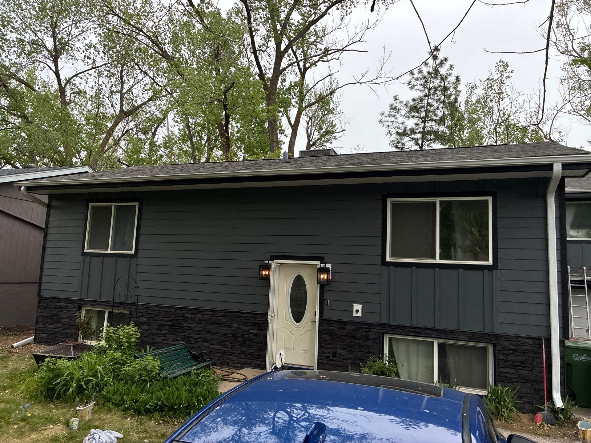 James Hardie Siding and Versetta Stone Exterior Renovation in Bellevue by Carps Complete Exteriors