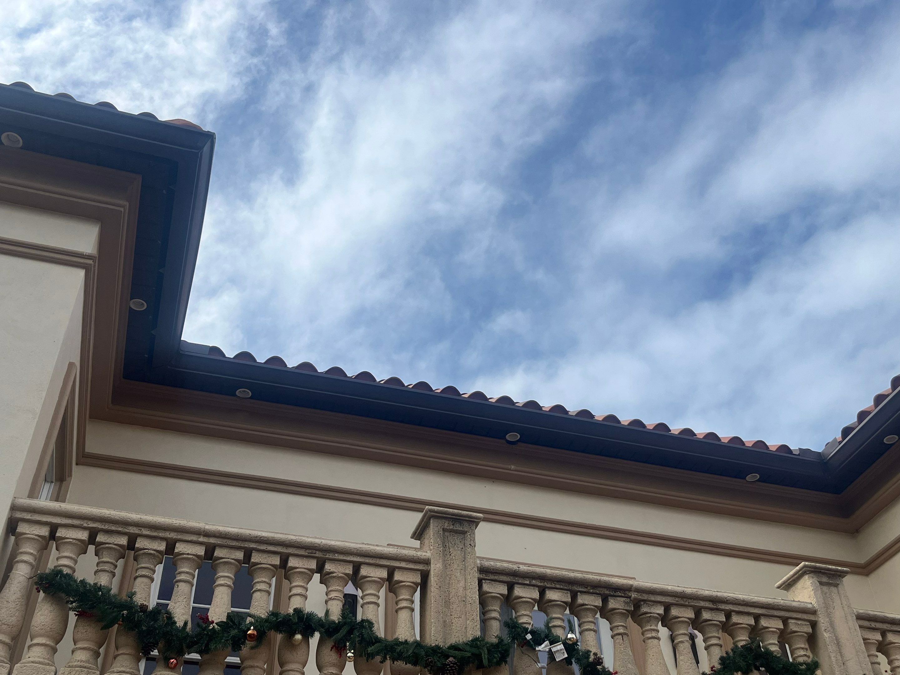 Musket Brown Seamless Gutters using Musket Brown Seamless Gutters in Cape Coral FL by Gutter Professors