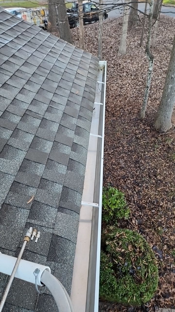 Gutter Cleaning using water by Power Wash Masters LLC