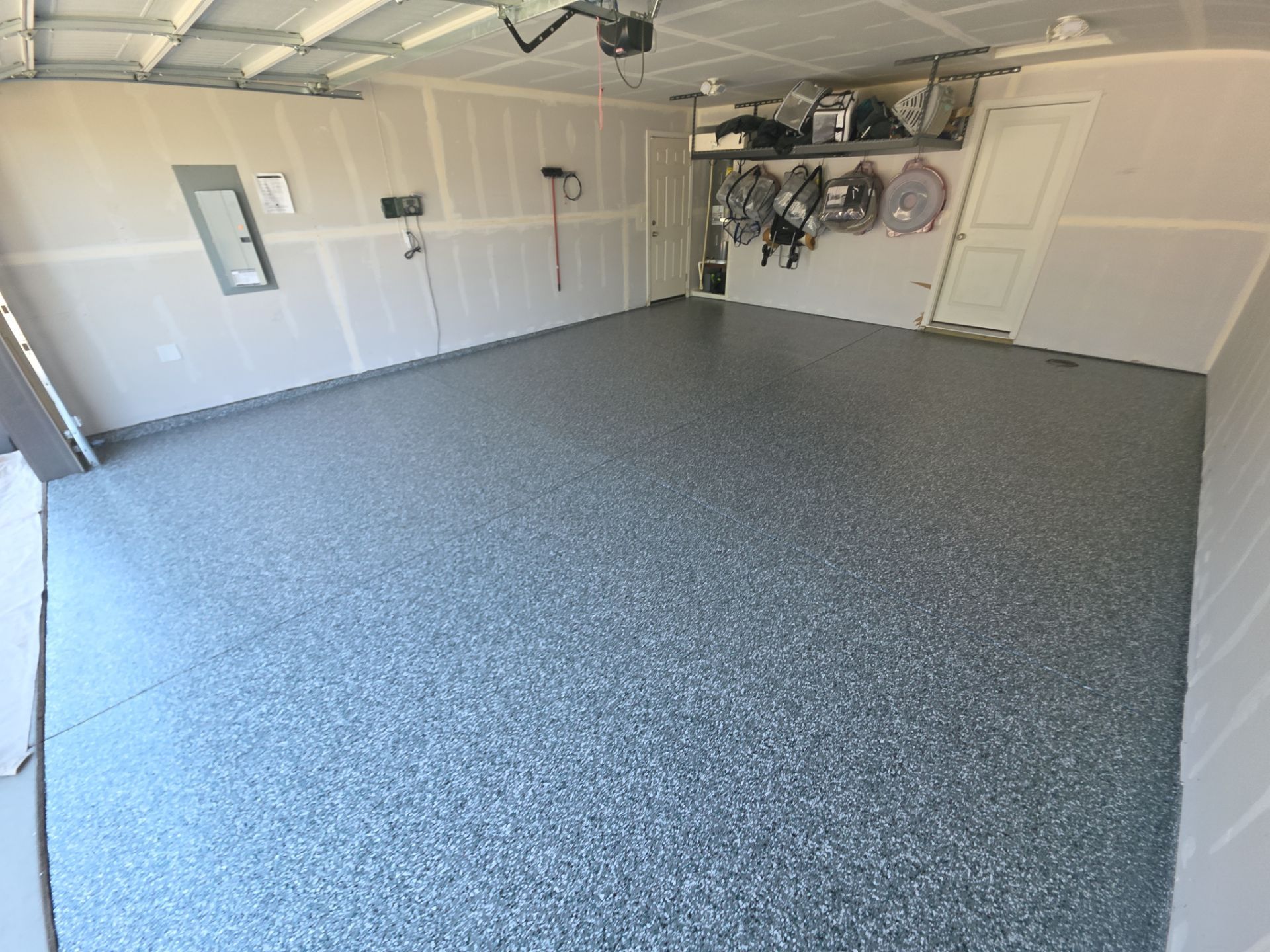 Residential Garage and Entryway Epoxy Floor Transformation in Spokane by Croc Coatings, LLC