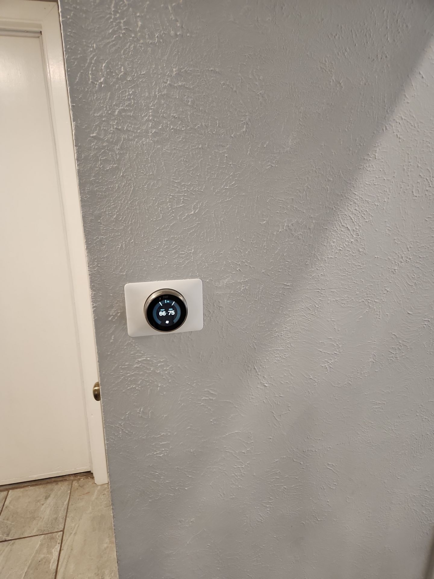 Drywall repair and door painting in S. Austin-78745 by RejuveNate Renovations LLC