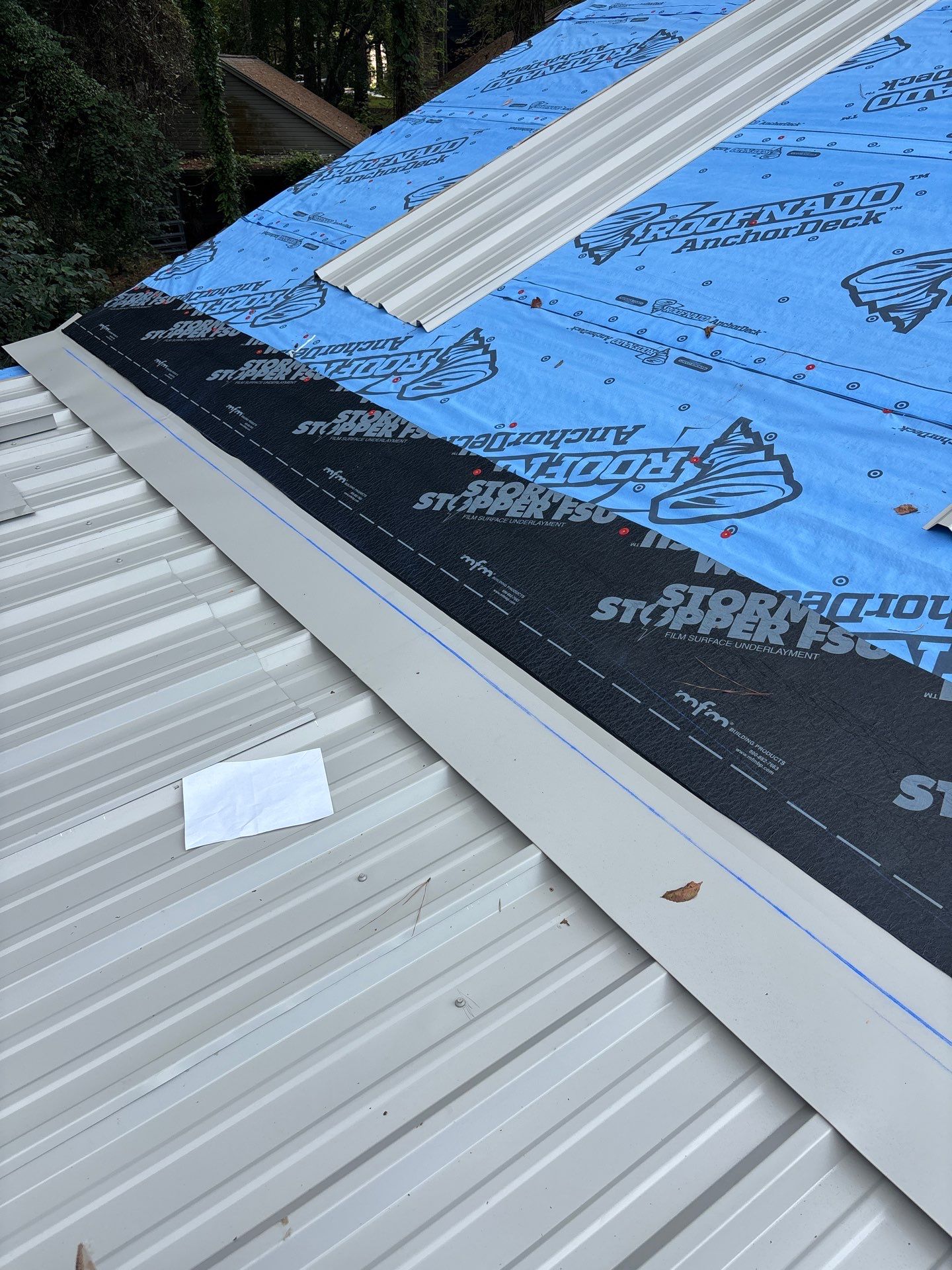 White Standing Seam Metal Roof Replacement in Willis, Texas by Abbott Roofing Company