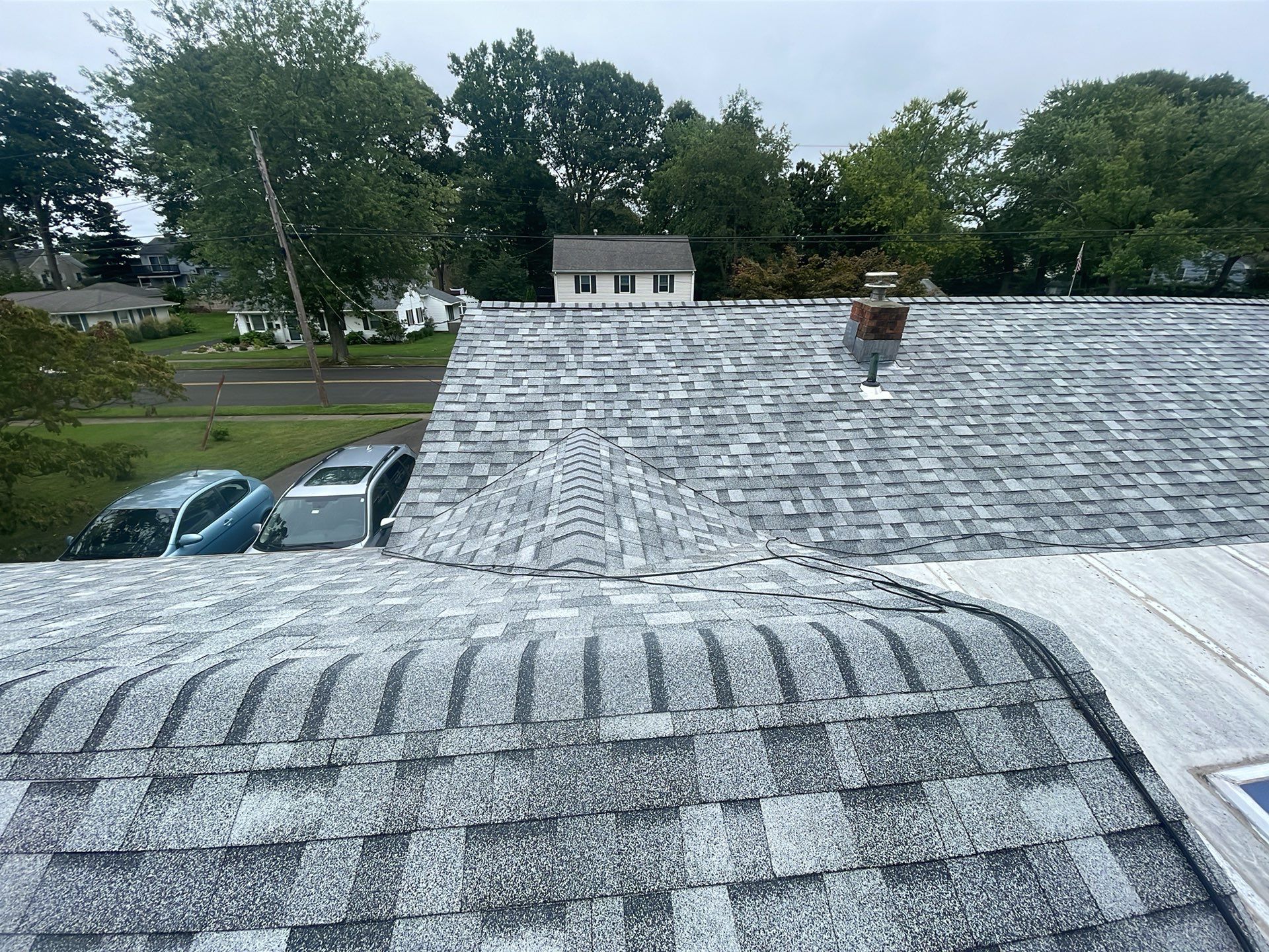 Residential Roofing Installation using Owens Corning TruDefinition Sierra Gray by A Plus Exterior