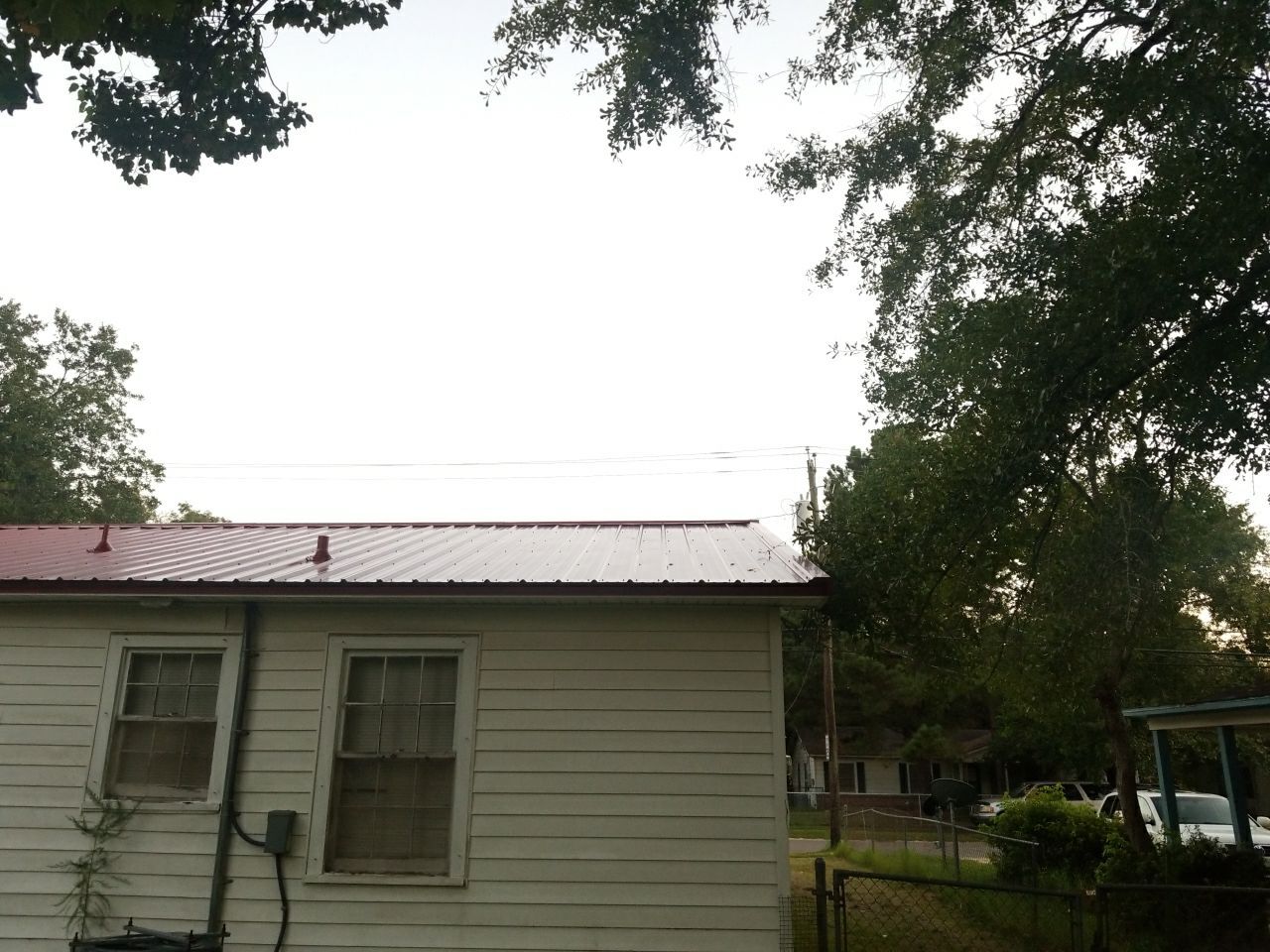 Residential Roofing Installation using Metal roofing by American Roofing & Construction LLC